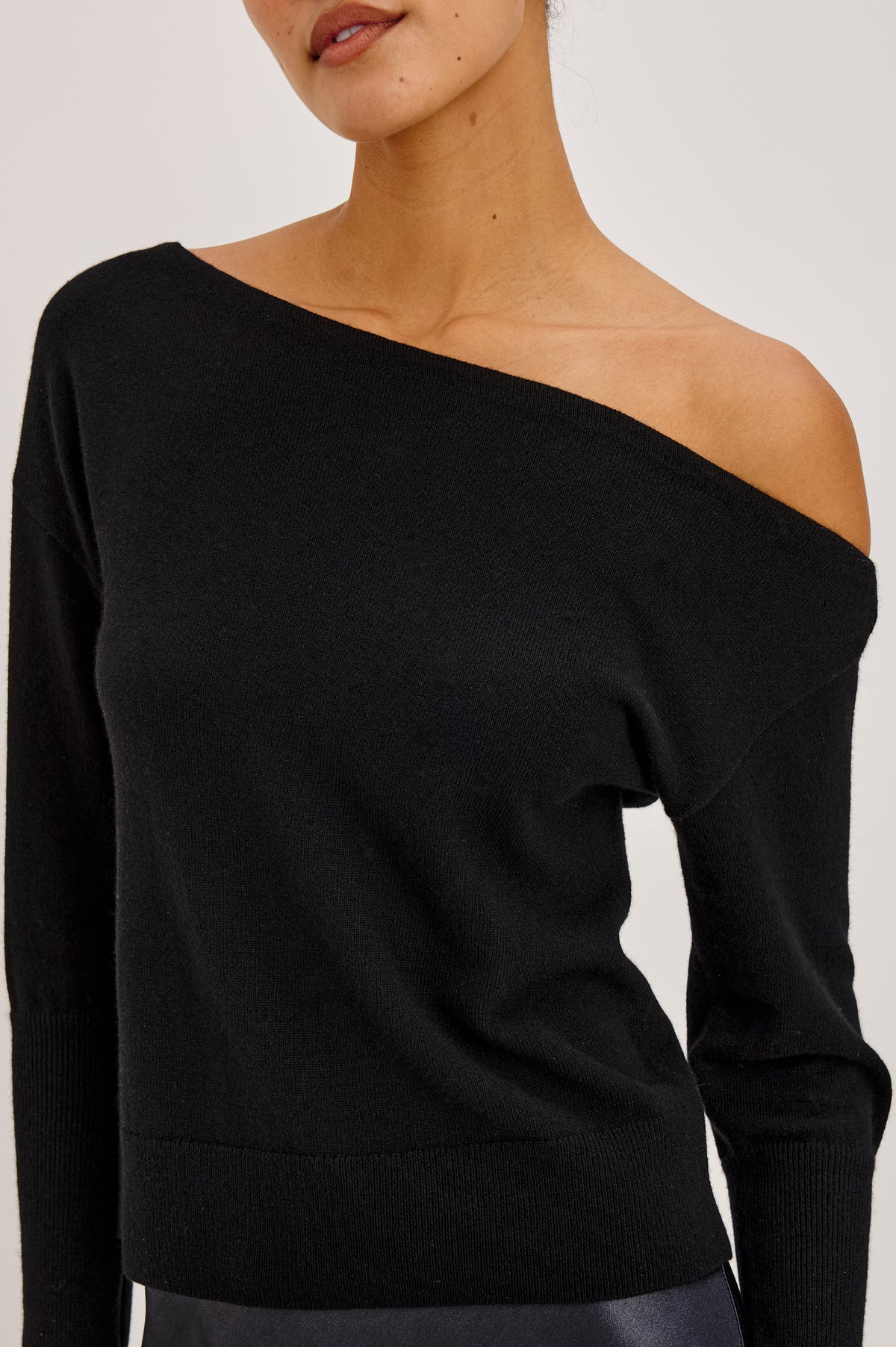 Tianna Sweater in Wool Blend With Off-Shoulder Neckline and Long Sleeves in Heather Charcoal Colorway - Upper Body Front Detail View Featured on Model.