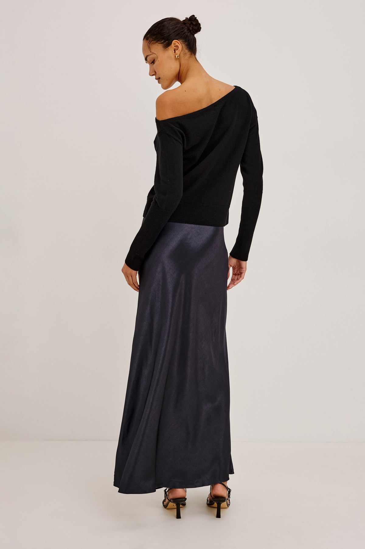 Tianna Sweater in Wool Blend With Off-Shoulder Neckline and Long Sleeves in Heather Charcoal Colorway - Upper Body Back View Featured on Model.