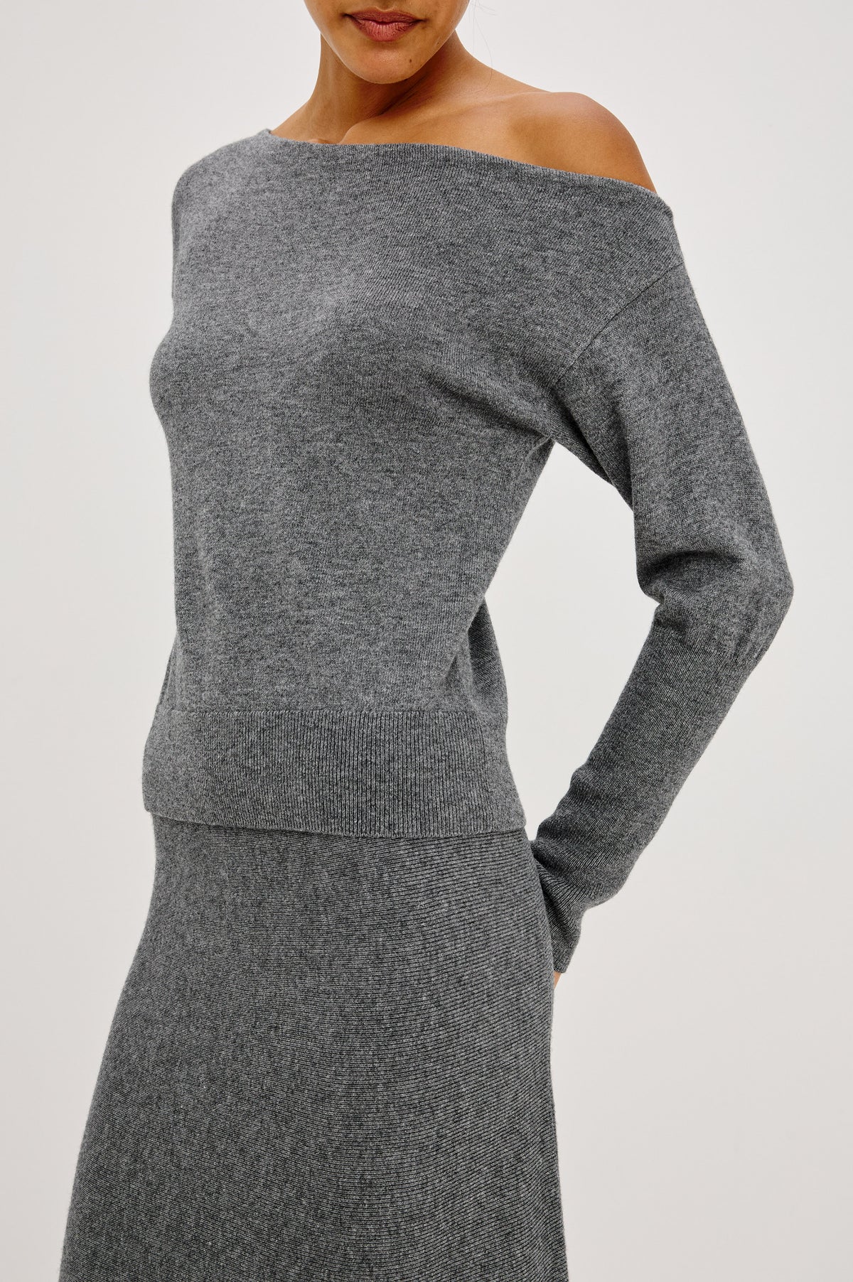 Tianna Sweater in Wool Blend With Off-Shoulder Neckline and Long Sleeves in Heather Charcoal Colorway - Front Crop Detail View Featured on Model.