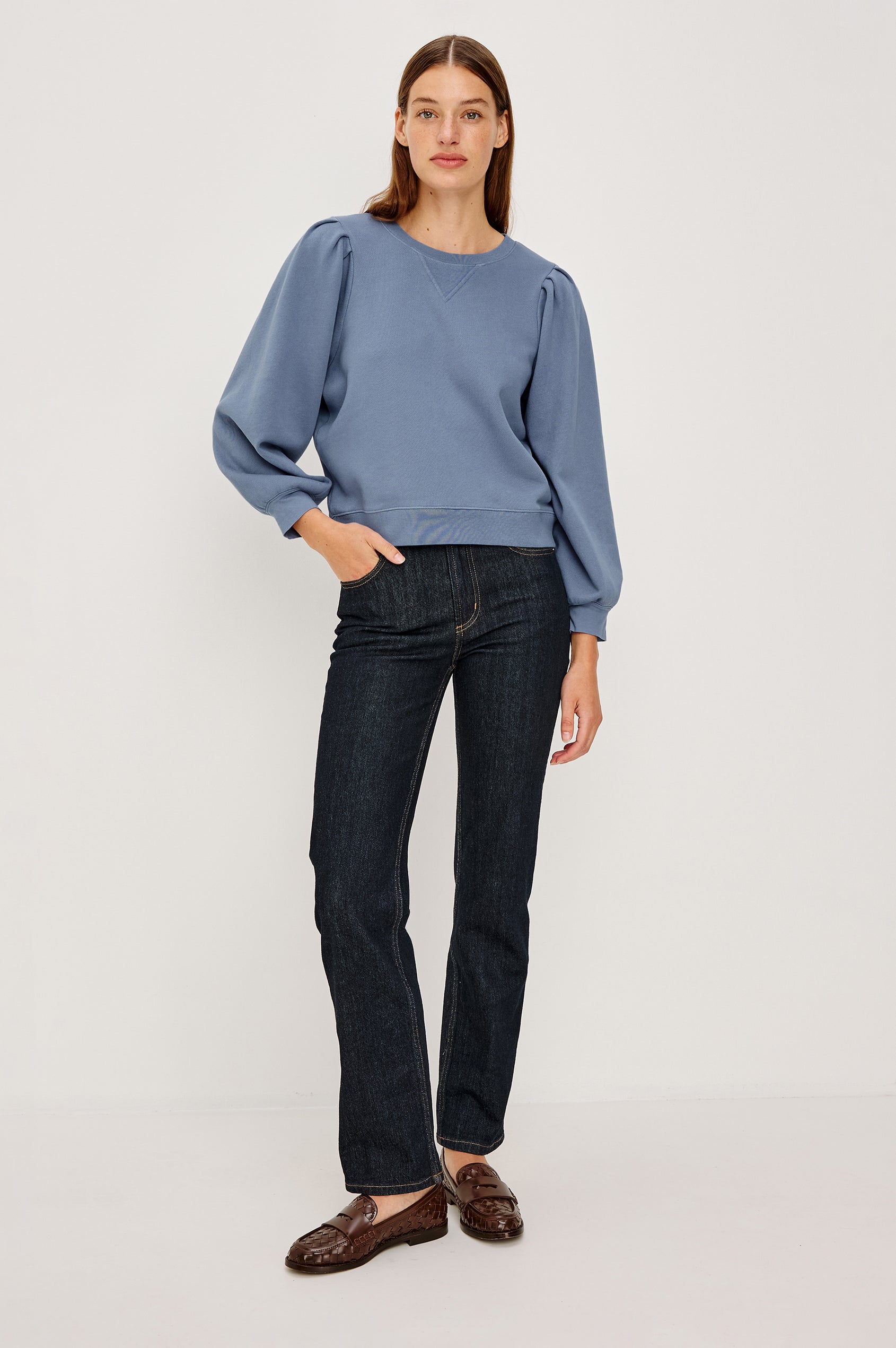 Tiffany Long-Sleeve Sweatshirt with a Crew Neck and Deep Pleated Sleeves in Faded Periwinkle Colorway - Full body Front View Featured on Model
