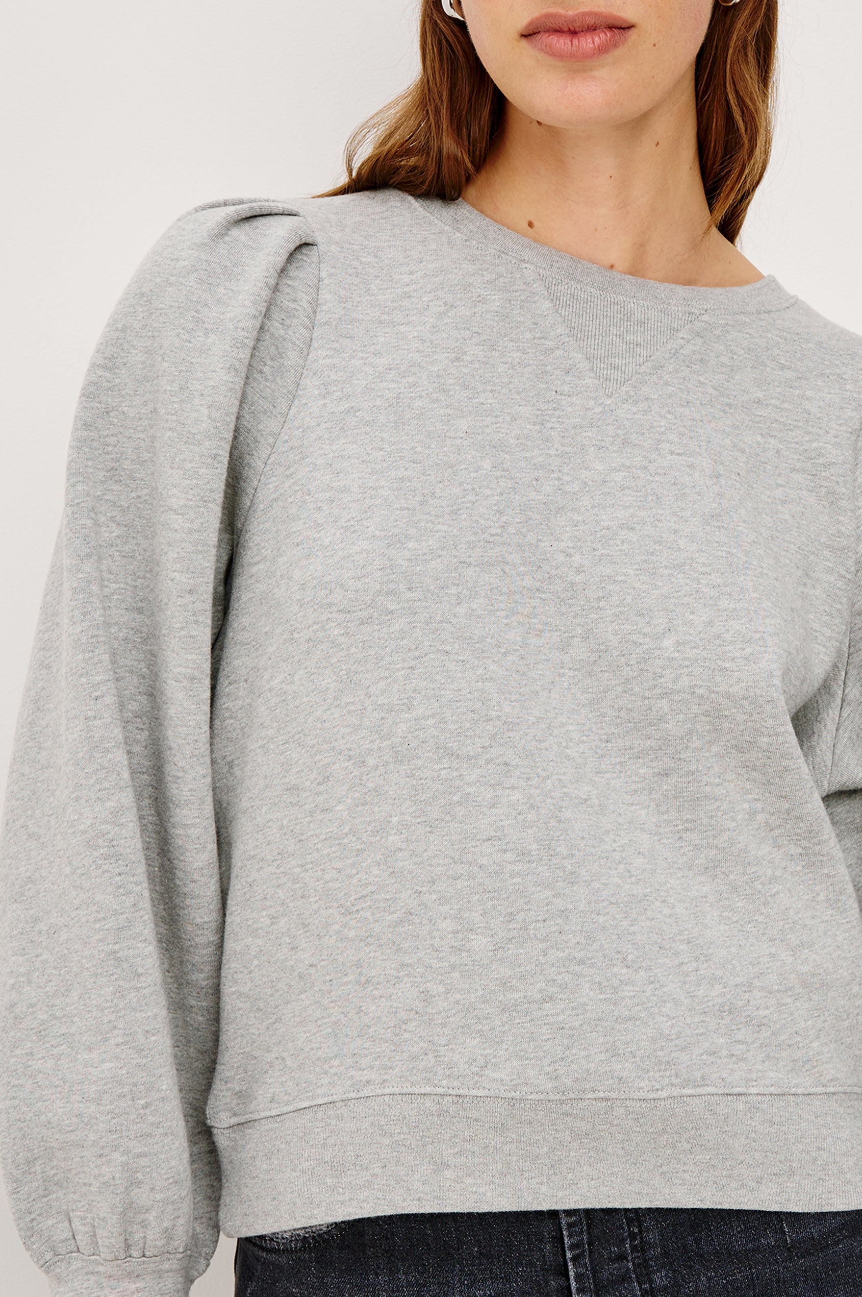 Tiffany Long-Sleeve Sweatshirt with a Crew Neck and Deep Pleated Sleeves in Heather Grey Colorway - Close up of details Featured on Model