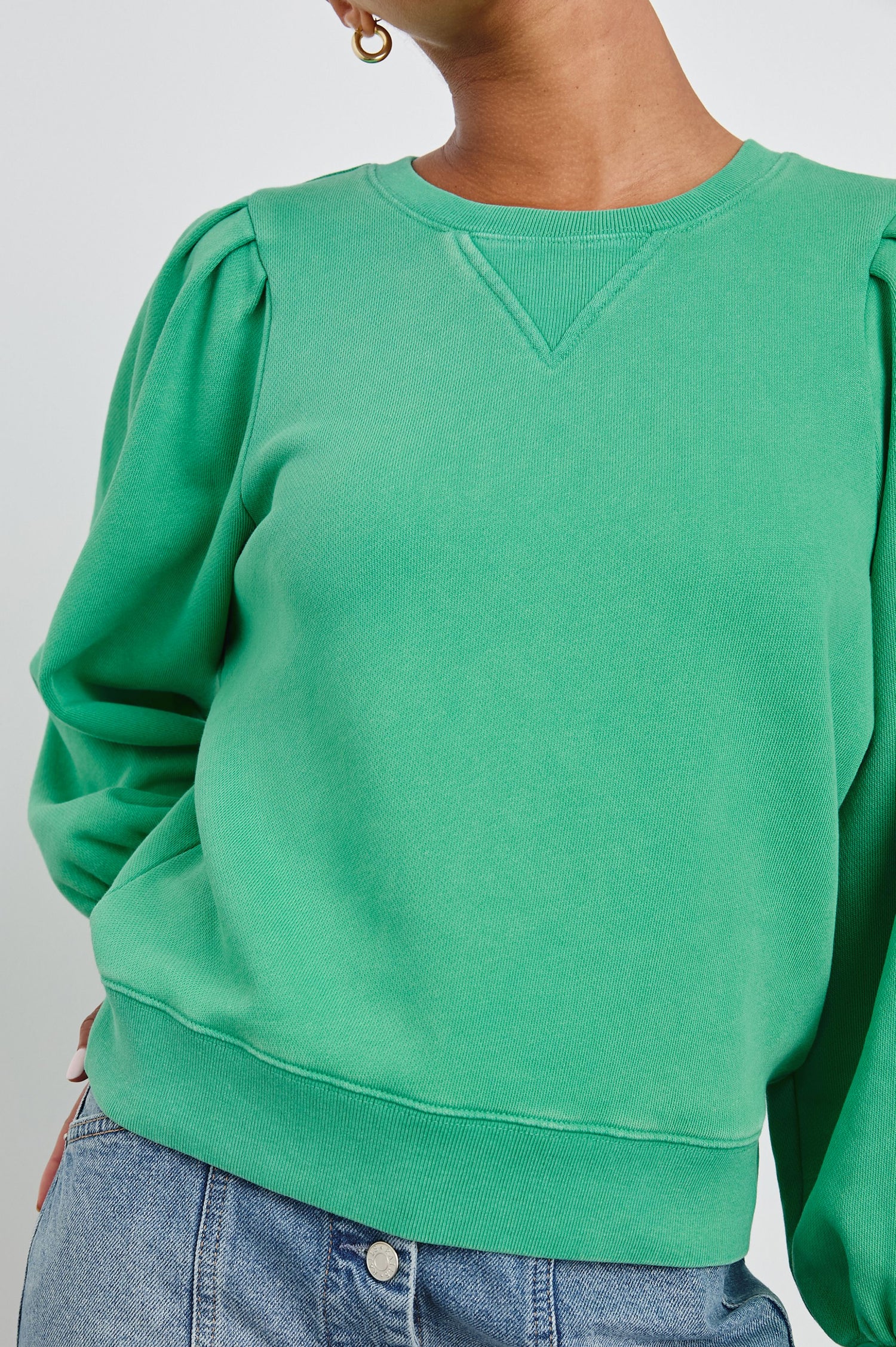 Tiffany Long-Sleeve Sweatshirt with a Crew Neck and Deep Pleated Sleeves in Kelly Green Colorway - Front View Featured on Model