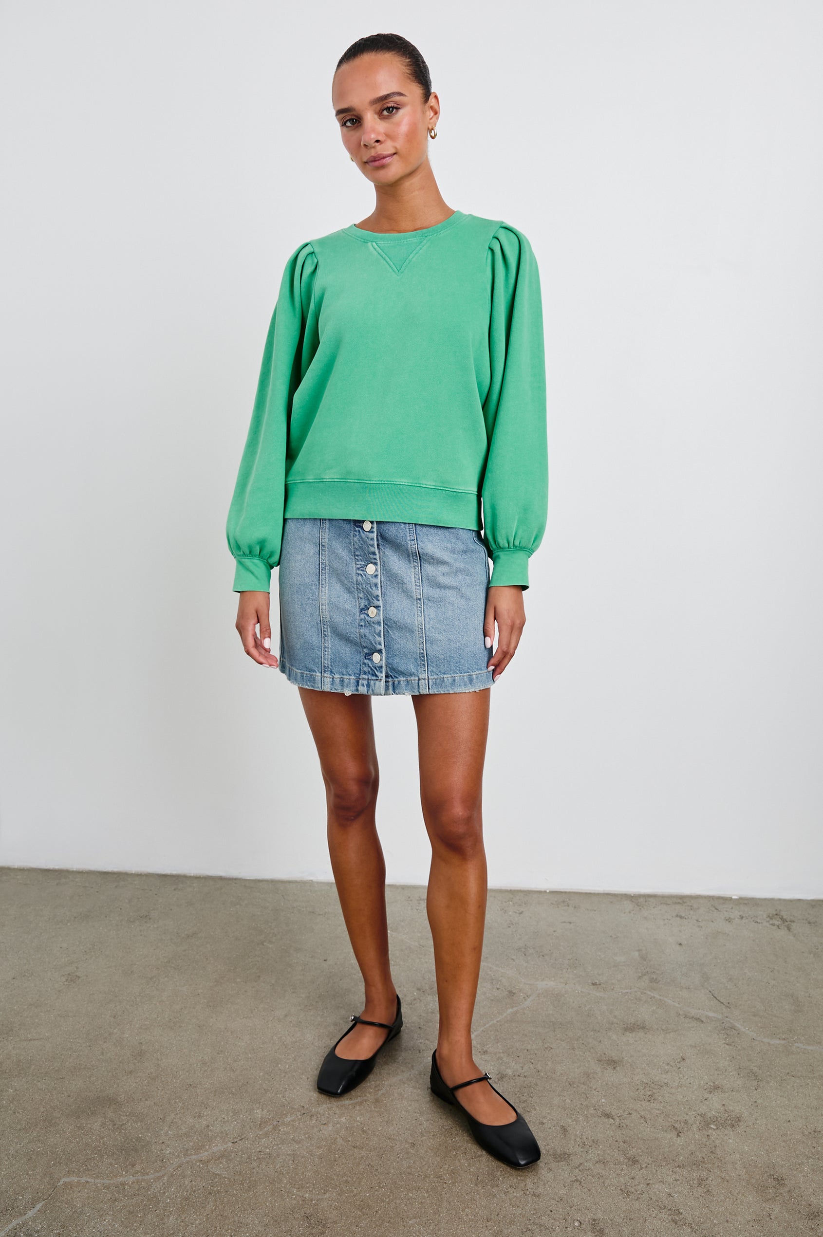 Tiffany Long-Sleeve Sweatshirt with a Crew Neck and Deep Pleated Sleeves in Kelly Green Colorway - Front Full Body View Featured on Model