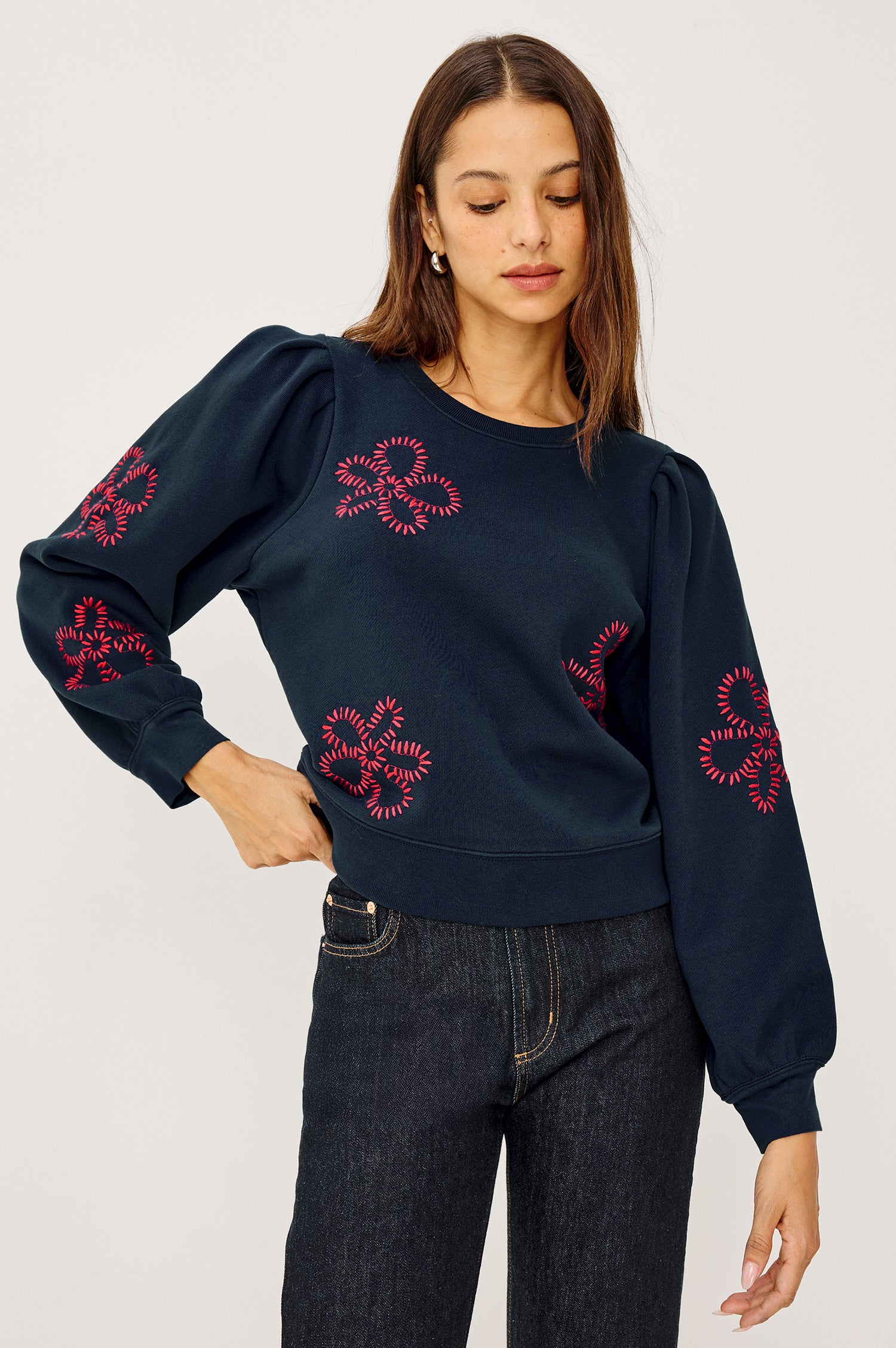 Tiffany Crewneck Sweatshirt in French Terry With Contrast Stitch Floral Motif Pattern, Long Puff Sleeves With Fitted Cuffs, and Ribbed Trim in Navy Colorway - Upper Body Front View Featured on Model