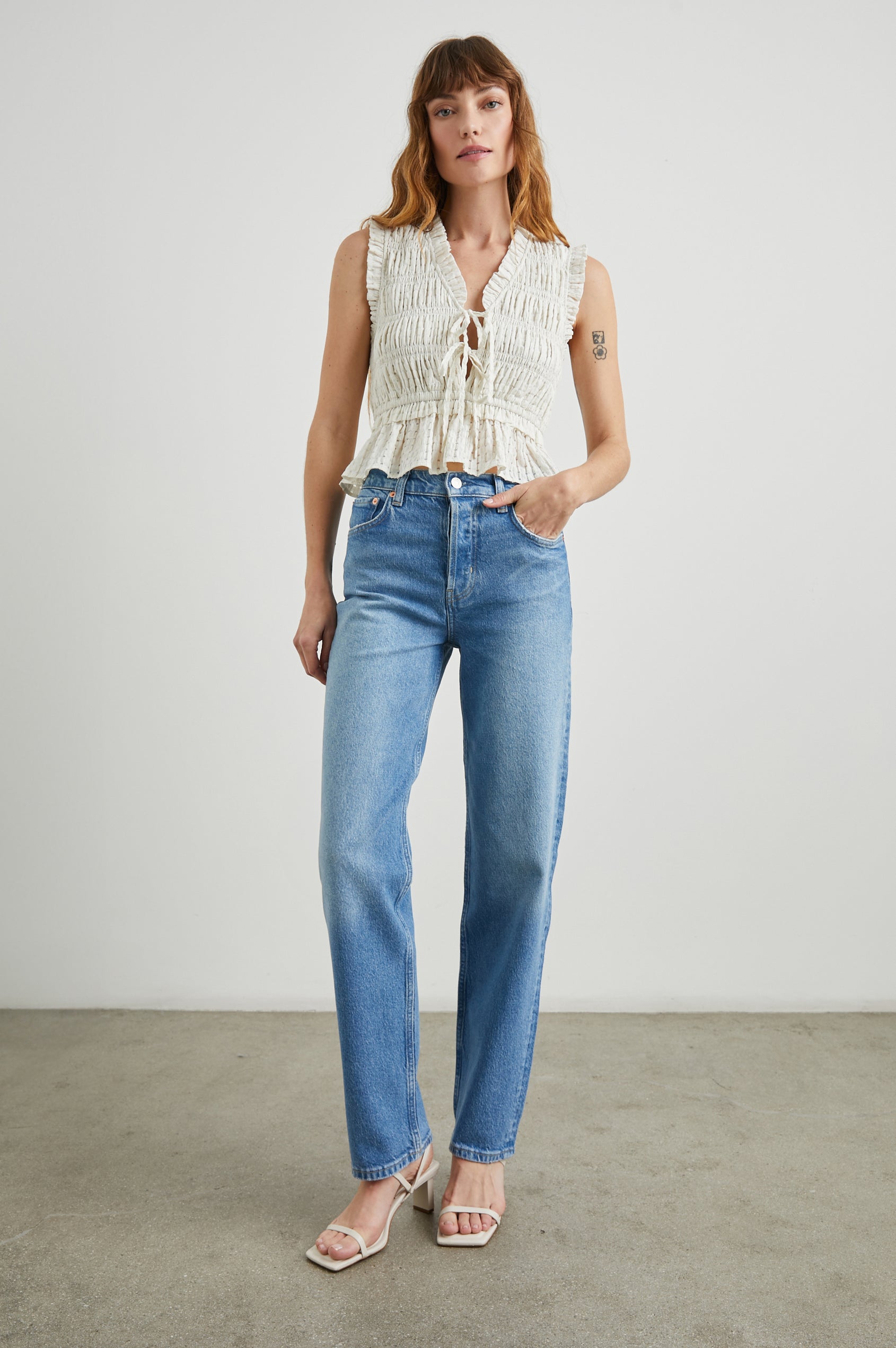 Topanga Straight Jeans with Belt Loops, Two Front Pockets plus a Coin Pocket and Two Back Patch Pockets in Baja Blue Colorway - Front Full Body View Featured on Model