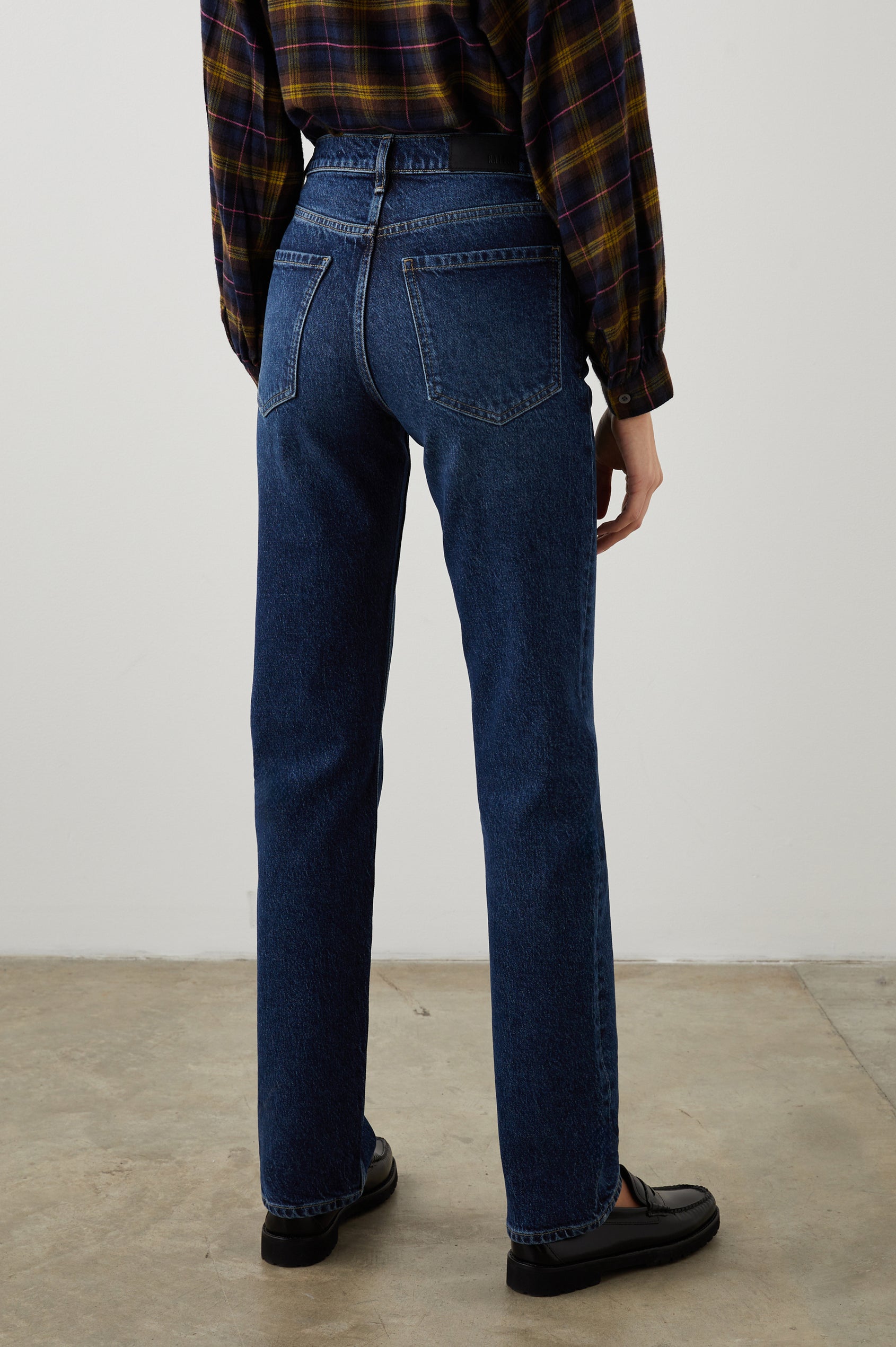 Topanga Straight Jeans with Belt Loops, Two Front Pockets plus a Coin Pocket and Two Back Patch Pockets in Collegiate Blue Colorway - Back View Featured on Model
