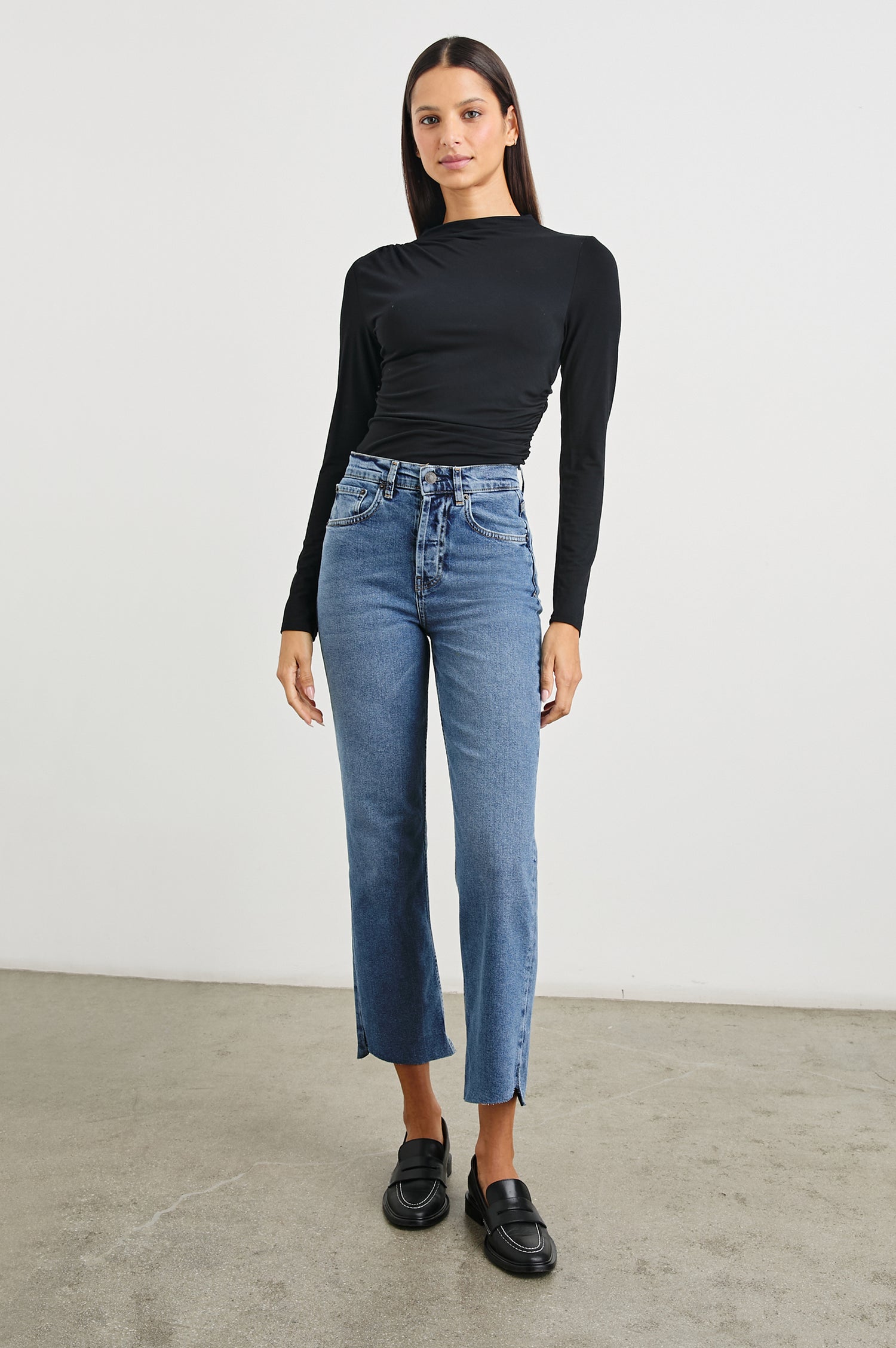 Topanga Crop Straight Jeans with an Asymmetrical Crop, Belt Loops, Two Front Pockets plus a Coin Pocket and Two Back Patch Pockets in Pure Indigo Colorway - Front Full Body View Featured on Model