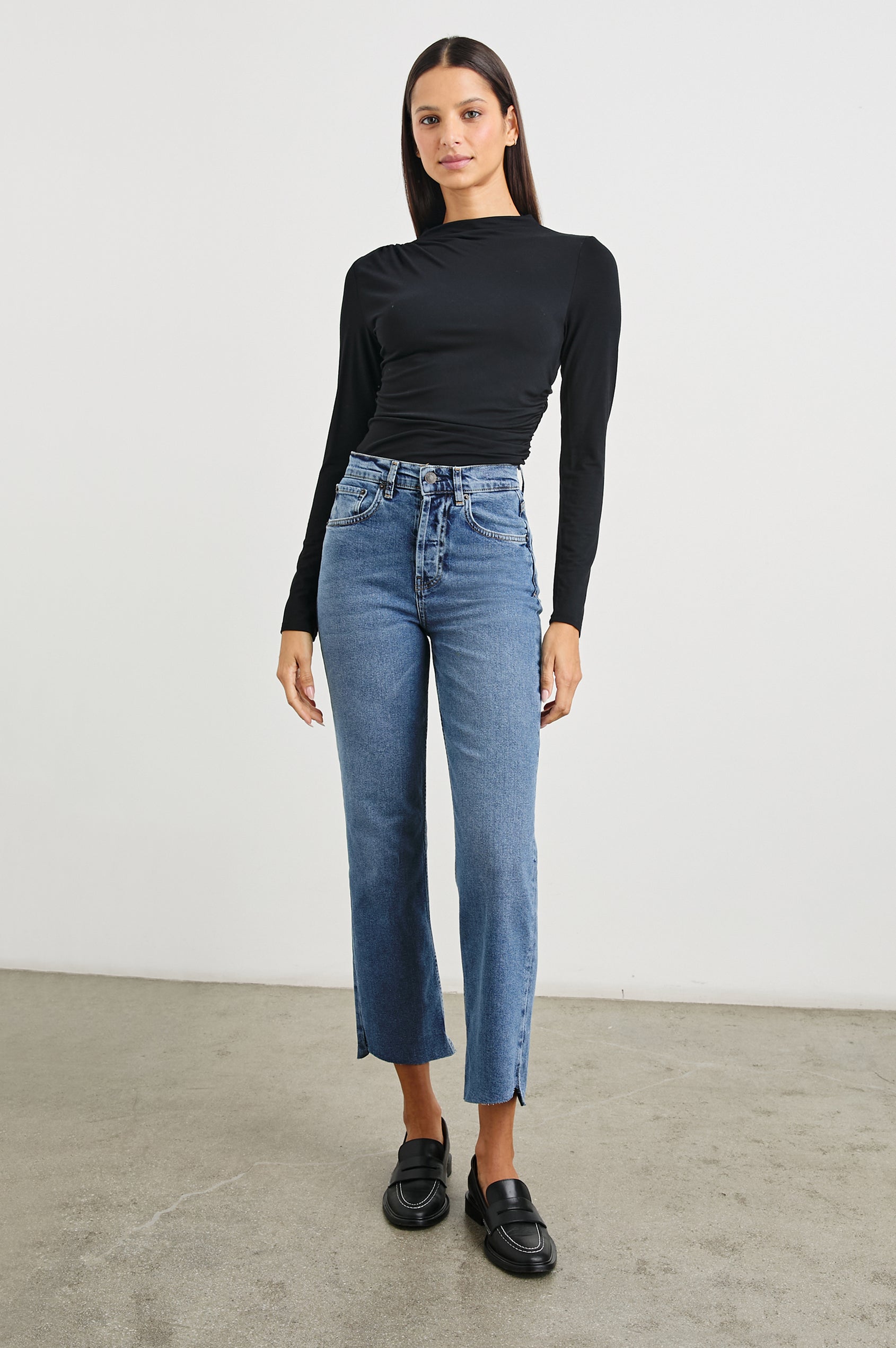 Topanga Crop Straight Jeans with an Asymmetrical Crop, Belt Loops, Two Front Pockets plus a Coin Pocket and Two Back Patch Pockets in Pure Indigo Colorway - Front Full Body View Featured on Model