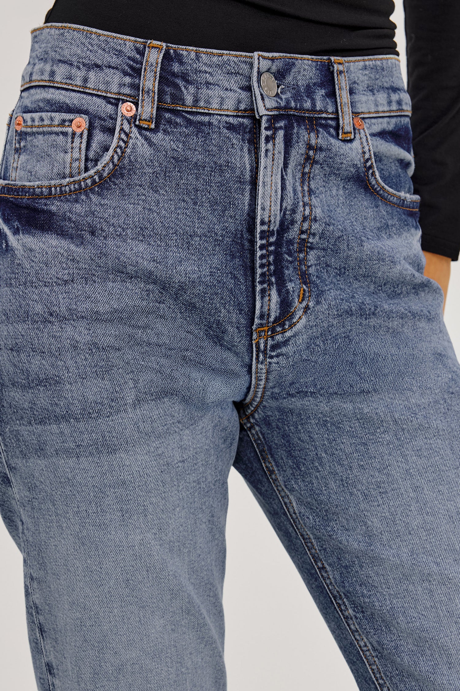 Topanga Straight Jean in Comfort-Stretch Denim With High-Rise, Distressed Knee, 5-Pockets, and Zipper Fly in Rancher Deconstructed Colorway - Lower Body Front View Featured on Model