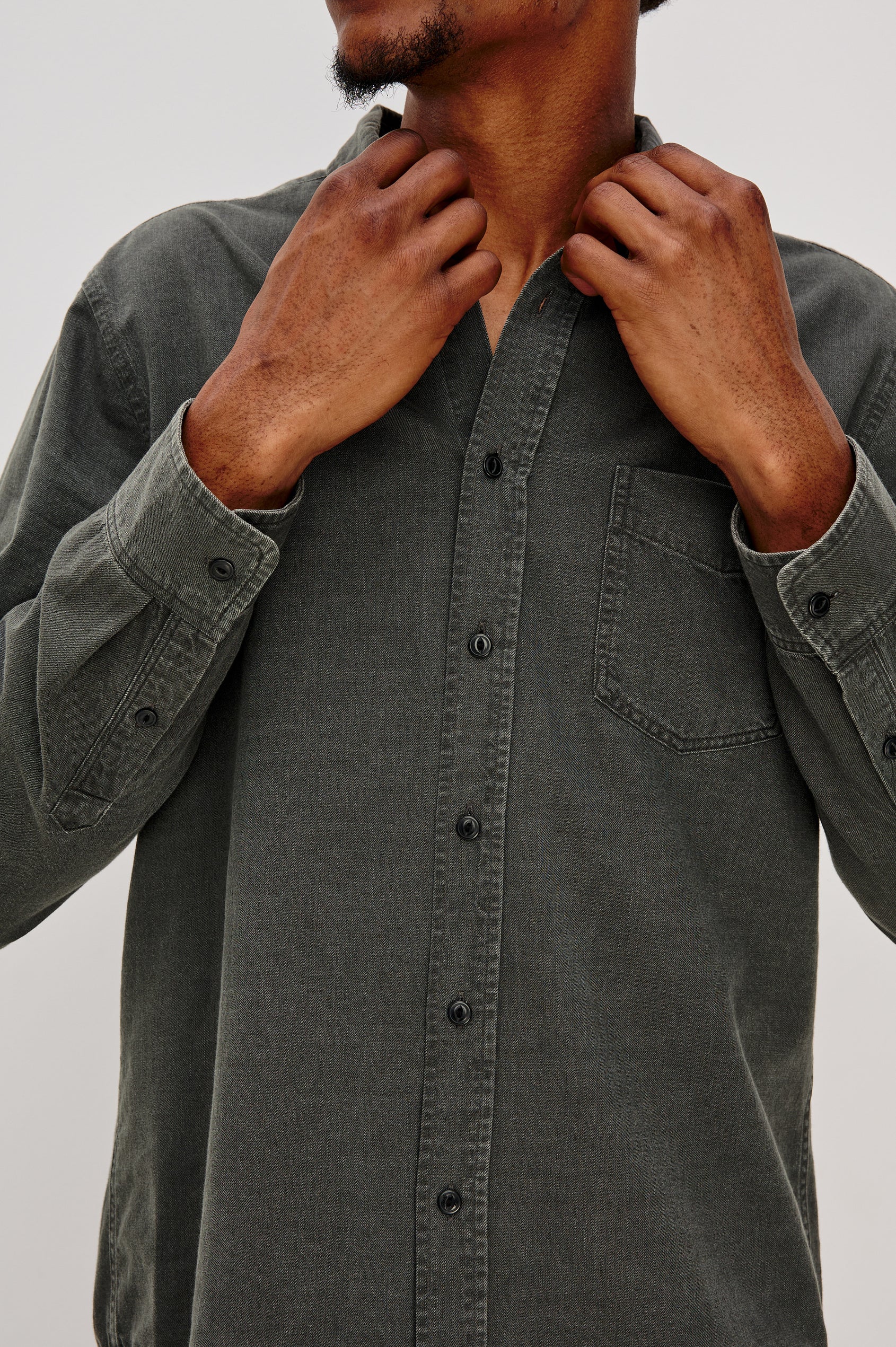 Tristan Long-Sleeve Button Down with a Chest Patch Pocket in Shadow Pass Colorway, a washed black/grey  - Front Detail View Featured on Model
