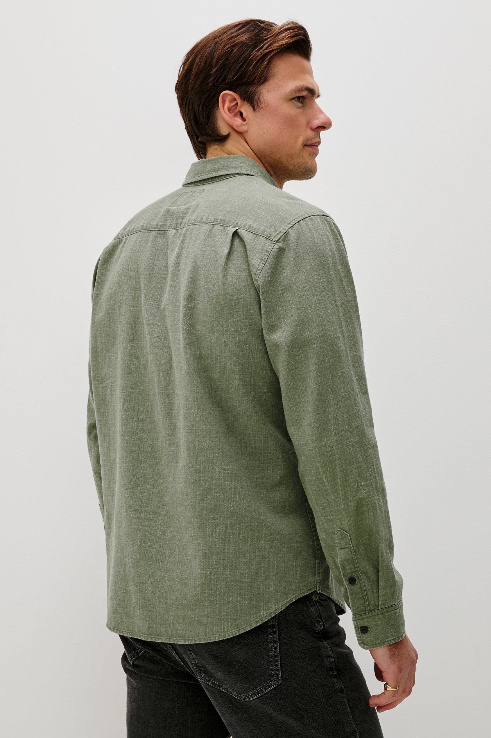 Tristan Long-Sleeve Button Down with a Chest Patch Pocket in Surplus Colorway, a olive green  - Back View Featured on Model