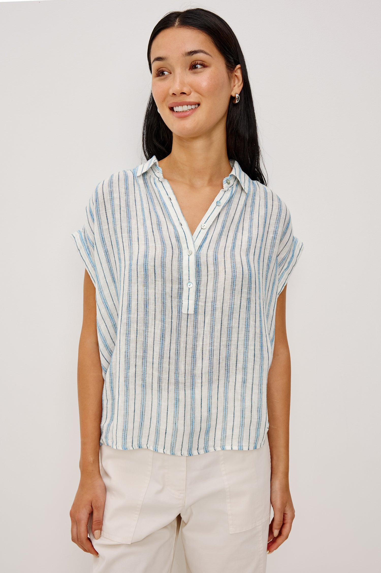 Tuscany Shirt in Linen With Collar, Front Half Placket, Capped Cuff Sleeves, and Relaxed Fit in Windward Stripe Colorway - Upper Body Front View Featured on Model