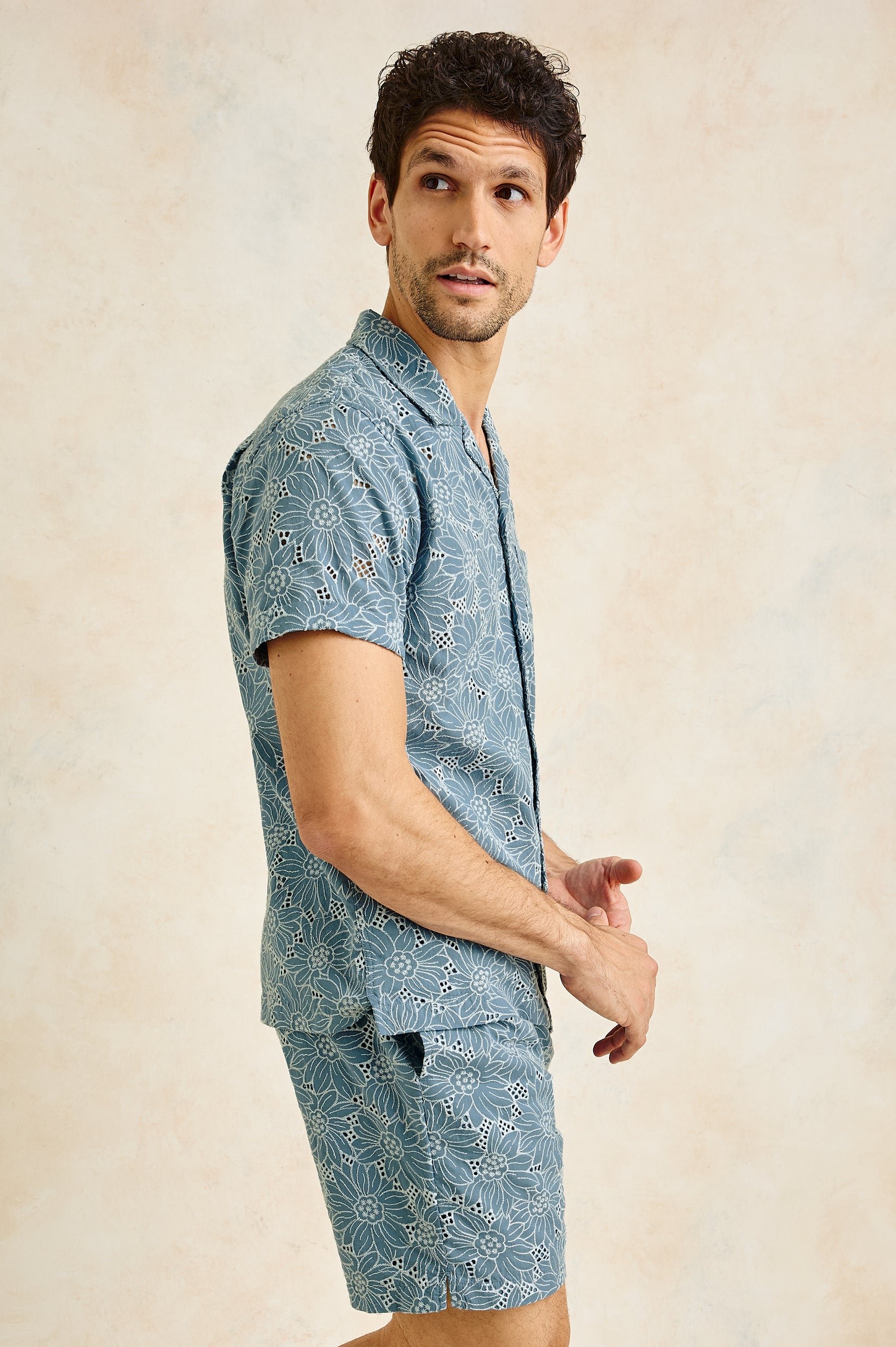 Tyler Collared Button Front Shirt with Short Sleeves in Multi Blue Colorway. Side View Shown on Model.