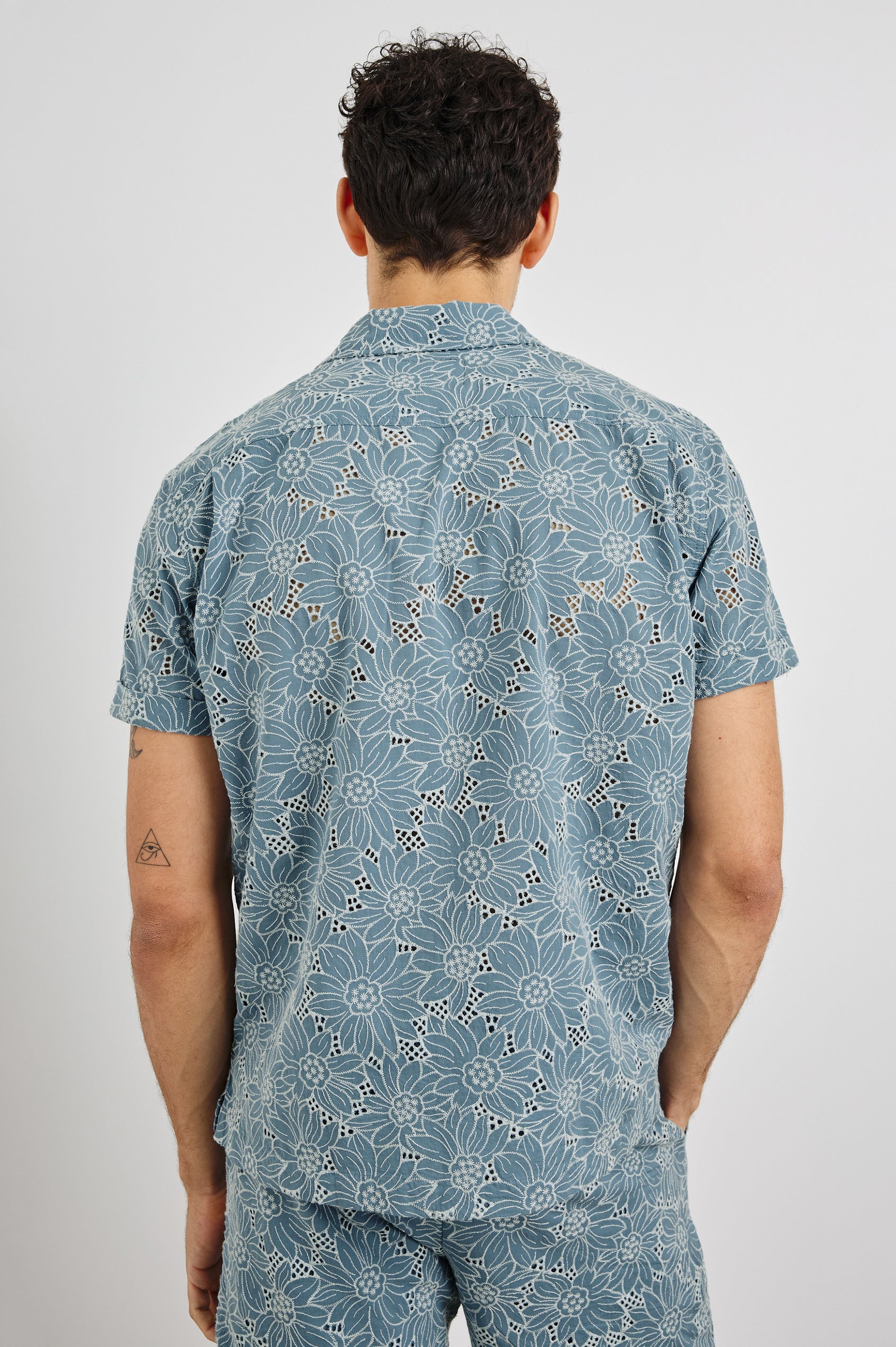 Tyler Collared Button Front Shirt with Short Sleeves in Multi Blue Colorway. Back View Shown on Model.
