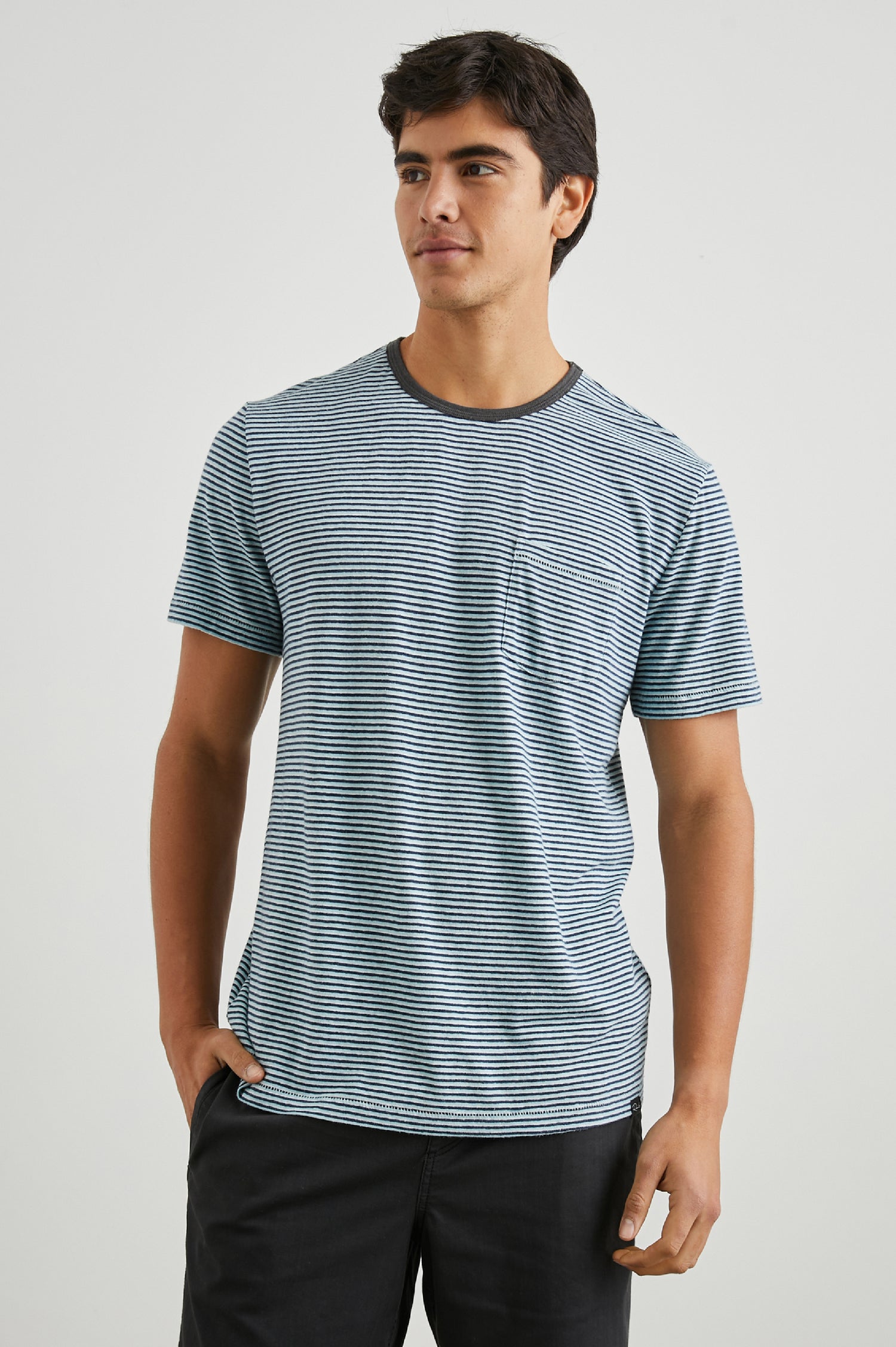 Valencia Short-Sleeve T-Shirt with a Crew Neck and a Chest Patch Pocket in Cerulean Sky Stripe Colorway, Horizontal Stripes - Front View Featured on Model  