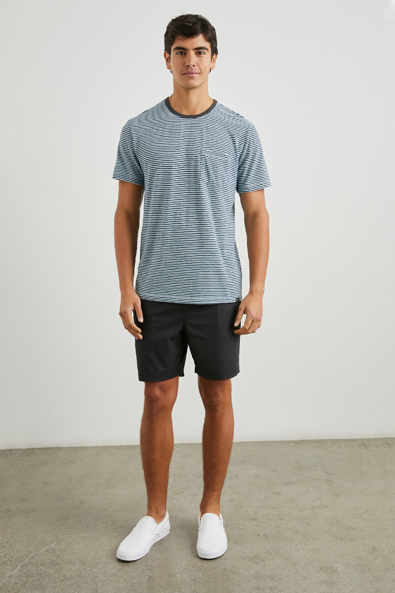 Valencia Short-Sleeve T-Shirt with a Crew Neck and a Chest Patch Pocket in Cerulean Sky Stripe Colorway, Horizontal Stripes - Front Full Body View Featured on Model  