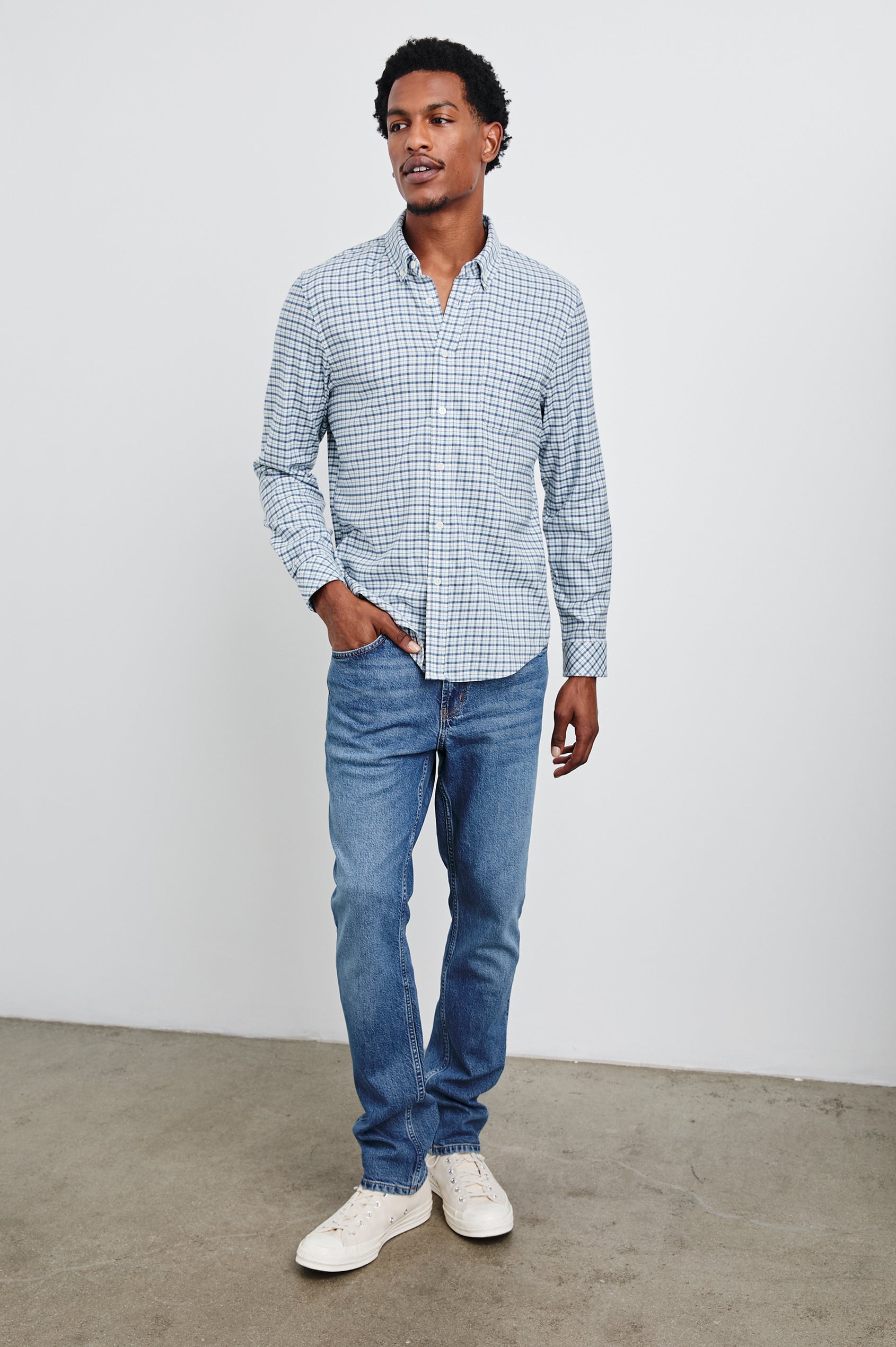 Vance Long-Sleeve Button Up with a Chest Patch Pocket in Stellar Navy Check Colorway, a plaid in white and blues - Front Full Body View Featured on Model