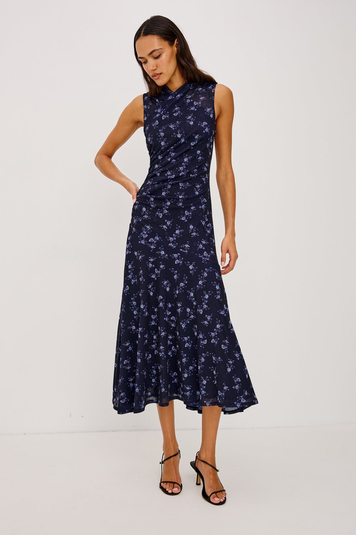 Vanya Maxi Dress in Stretch Mesh With Fitted Wrap-Style Bodice, Side Ruching, and Angled Tier Seam in Navy Romantic Floral Colorway - Full Body Front View Featured on Model