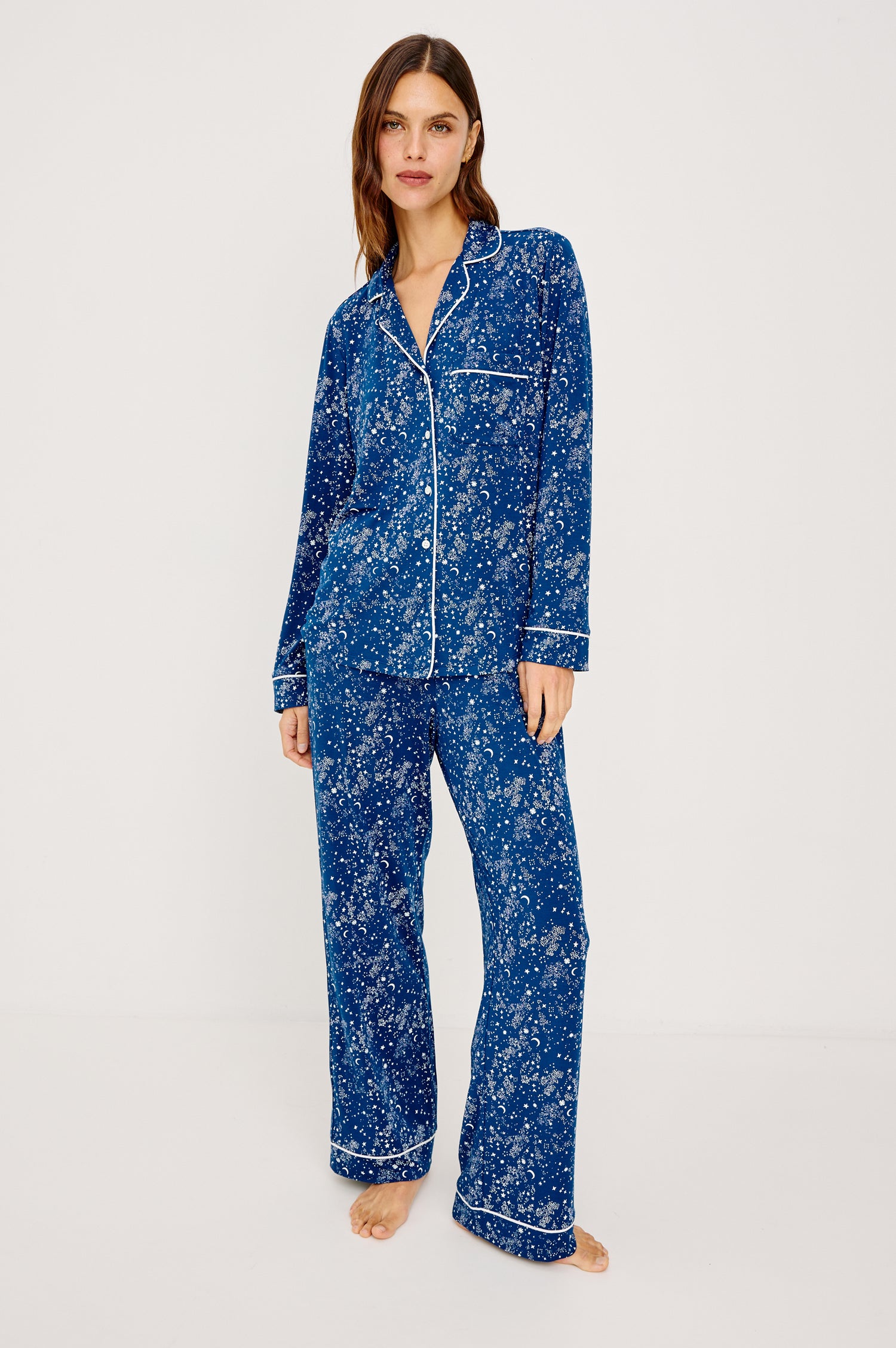 Varra Pajama Set in Jersey With Contrast Piping Button-Up Shirt With Notched Collar and Long Sleeves and Matching High-Waisted Pants With Adjustable Waist Drawstring Ties in Loose Fit in Starry Night Colorway - Full Body Front View Featured on Model
