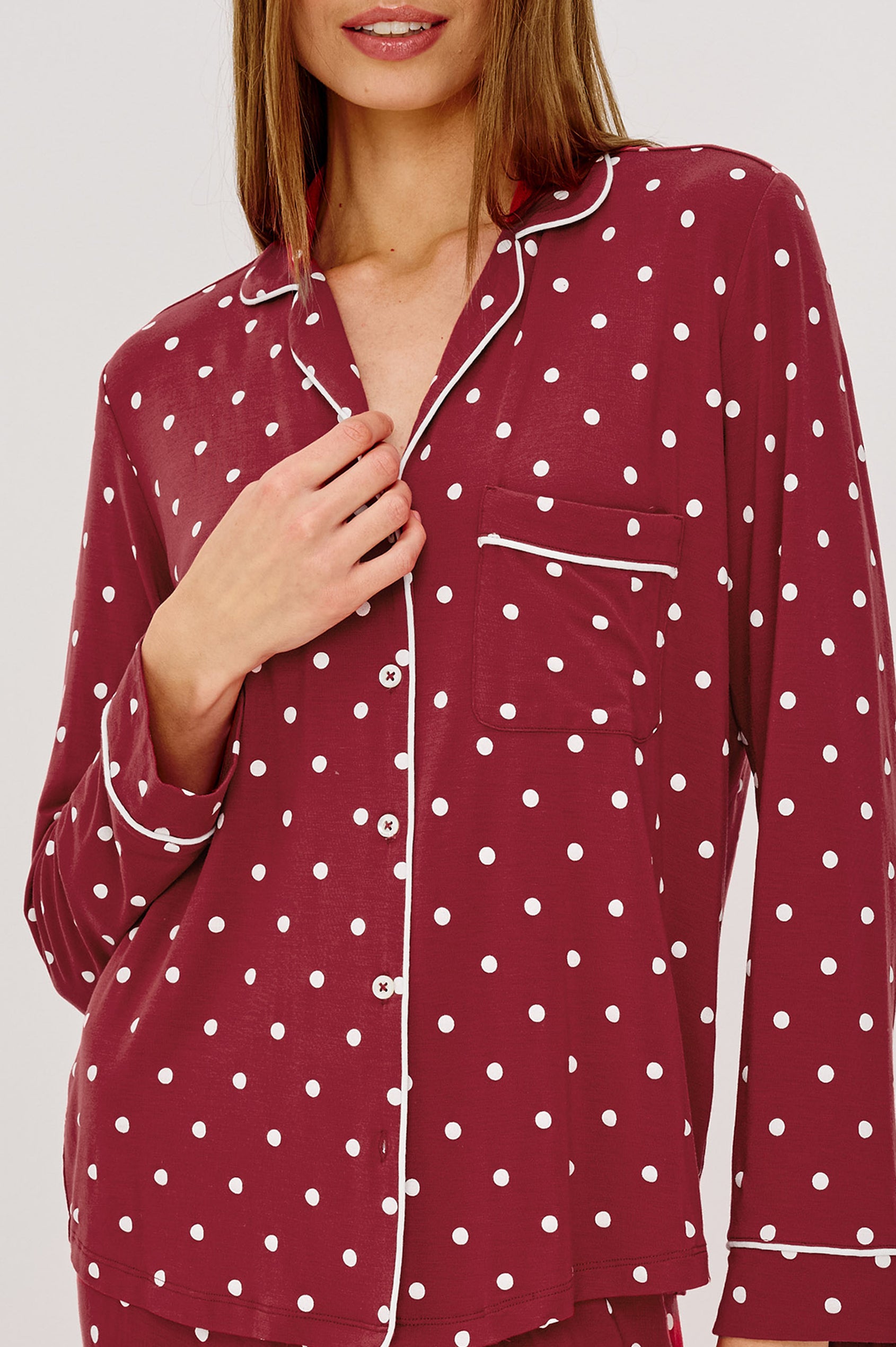 Varra Pajama Set in Soft Jersey With Contrast Piping, Relaxed Fit, Long Sleeve Collared Button-Up Shirt, and Straight-Leg Pants in Cardinal Polka Colorway - Upper Body Front View Featured on Model