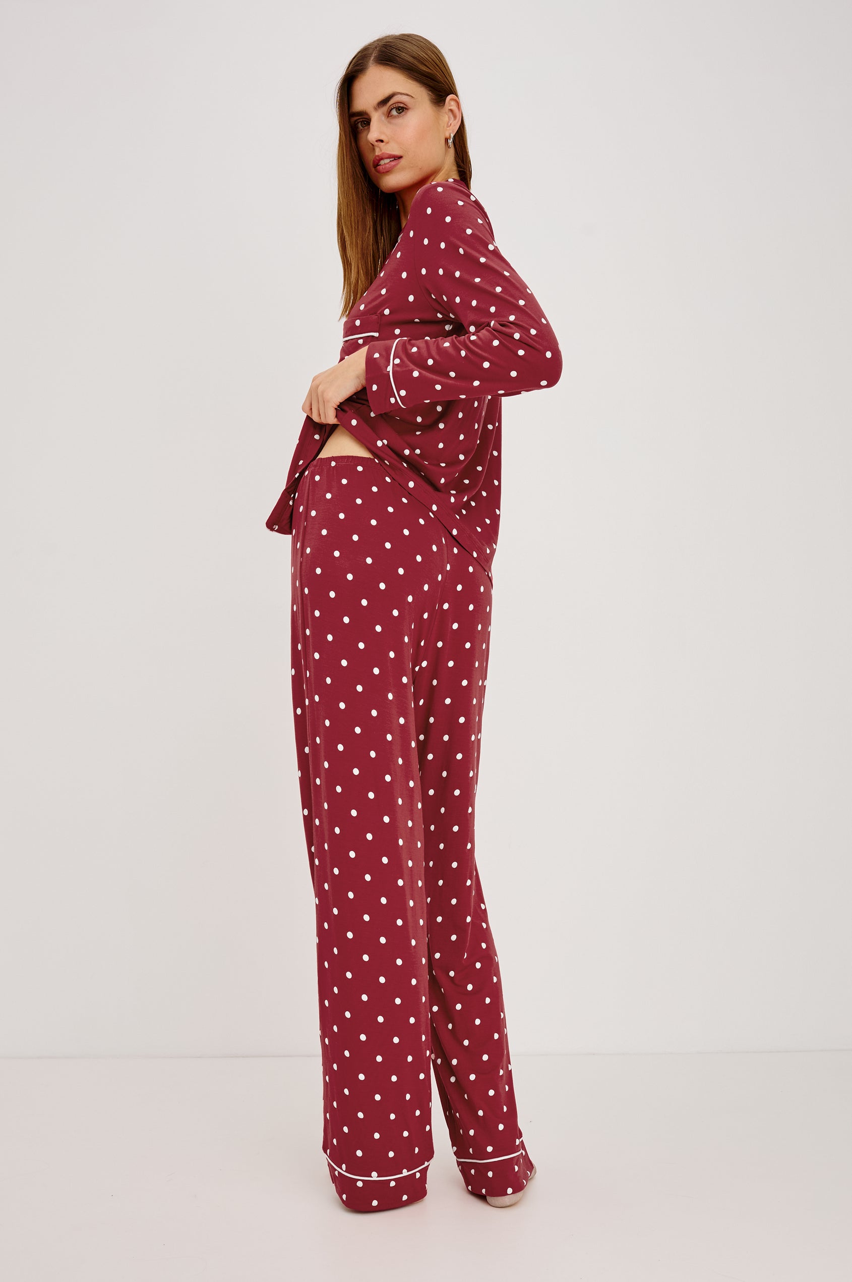 Varra Pajama Set in Soft Jersey With Contrast Piping, Relaxed Fit, Long Sleeve Collared Button-Up Shirt, and Straight-Leg Pants in Cardinal Polka Colorway - Full Body Back View Featured on Model