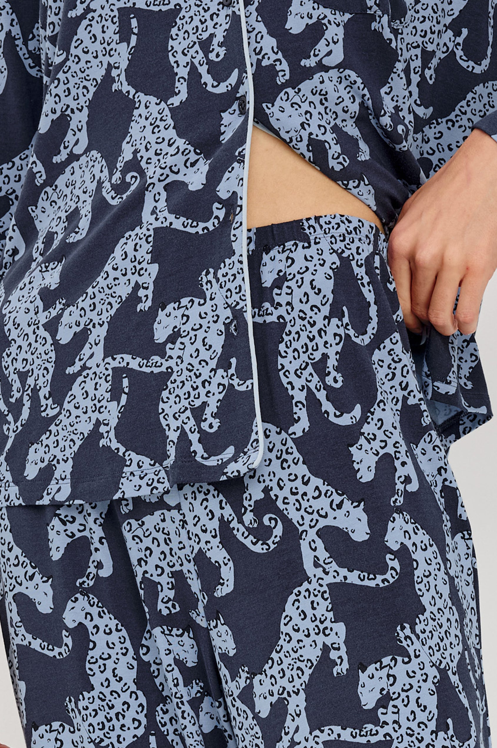 Varra Pajama Set in Soft Jersey With Contrast Piping, Relaxed Fit, Long Sleeve Collared Button-Up Shirt, and Straight-Leg Pants in Midnight Jaguar Colorway - Lower Body Close Up View Featured on Model
