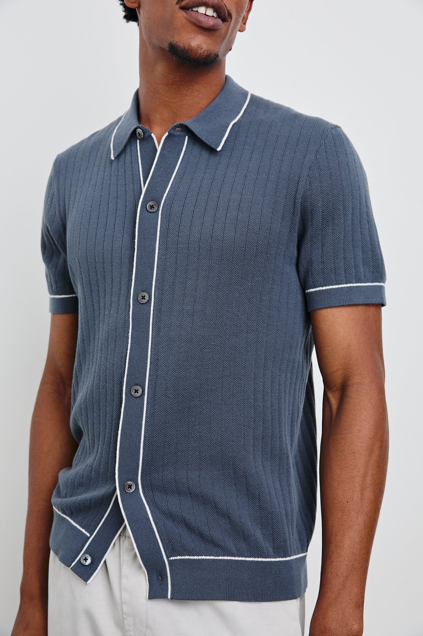 Vernon Short-Sleeve, Ribbed Button Up in Faded Navy Colorway with white trim - Front View Featured on Model