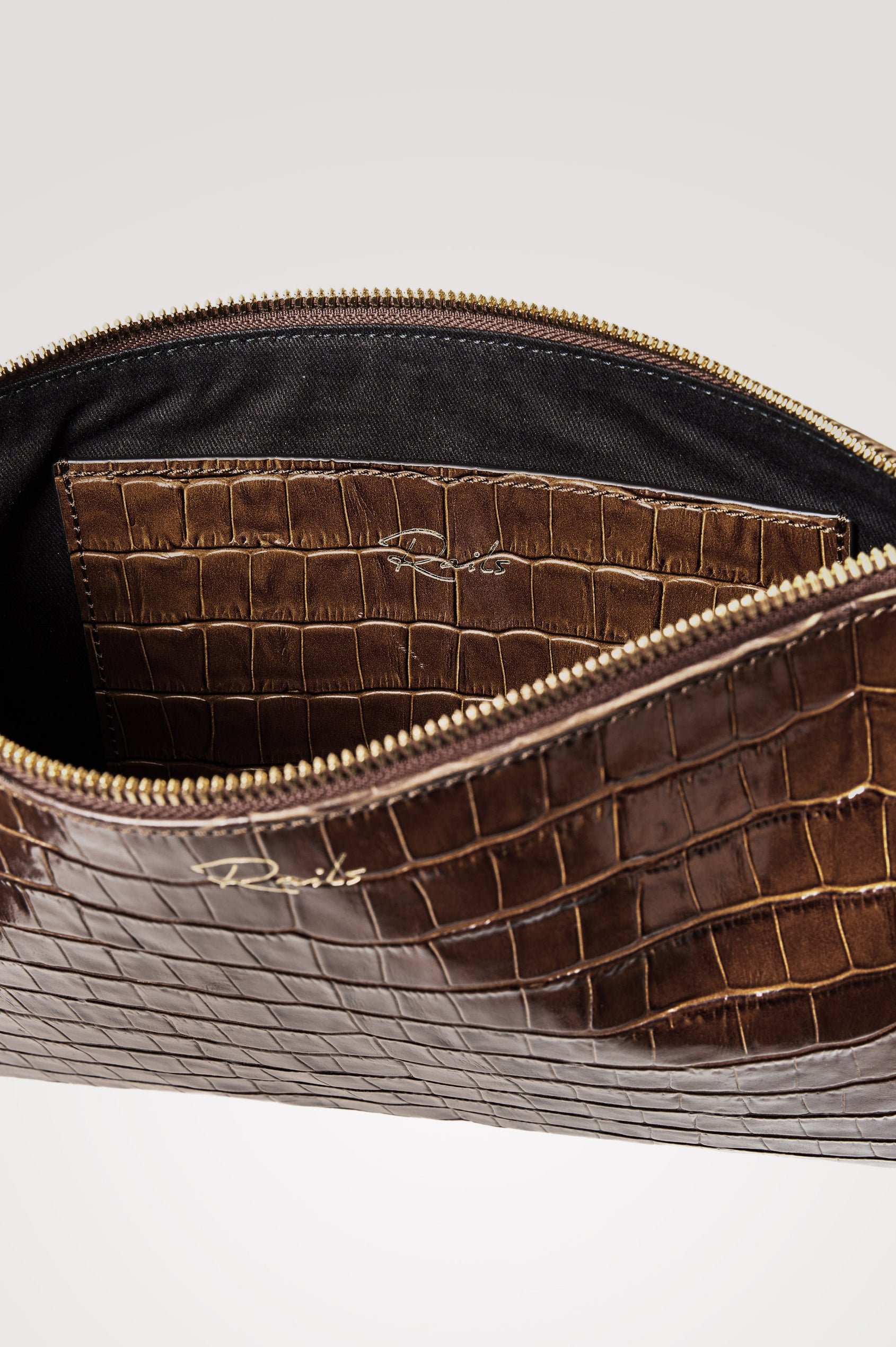 Verona Clutch Bag in Croc-Embossed Leather With Attached Wristlet Strap, Top Zip Closure, and Interior Slip Pocket in Brown Croc Embossed Colorway - Front Product View Featured