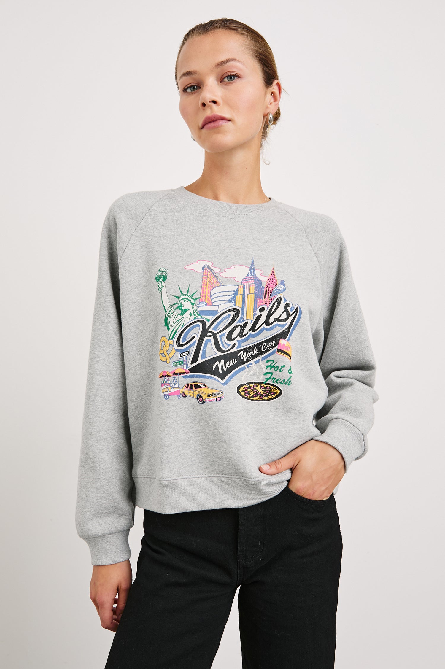 Vintage Raglan Long-Sleeve Sweatshirt with a Crew Neck, an image of landmarks in Los Angeles and the Text, Rails New York City, Hot and Fresh in Rails New York Colorway, Multi Colored on Grey - Front View Featured on Model