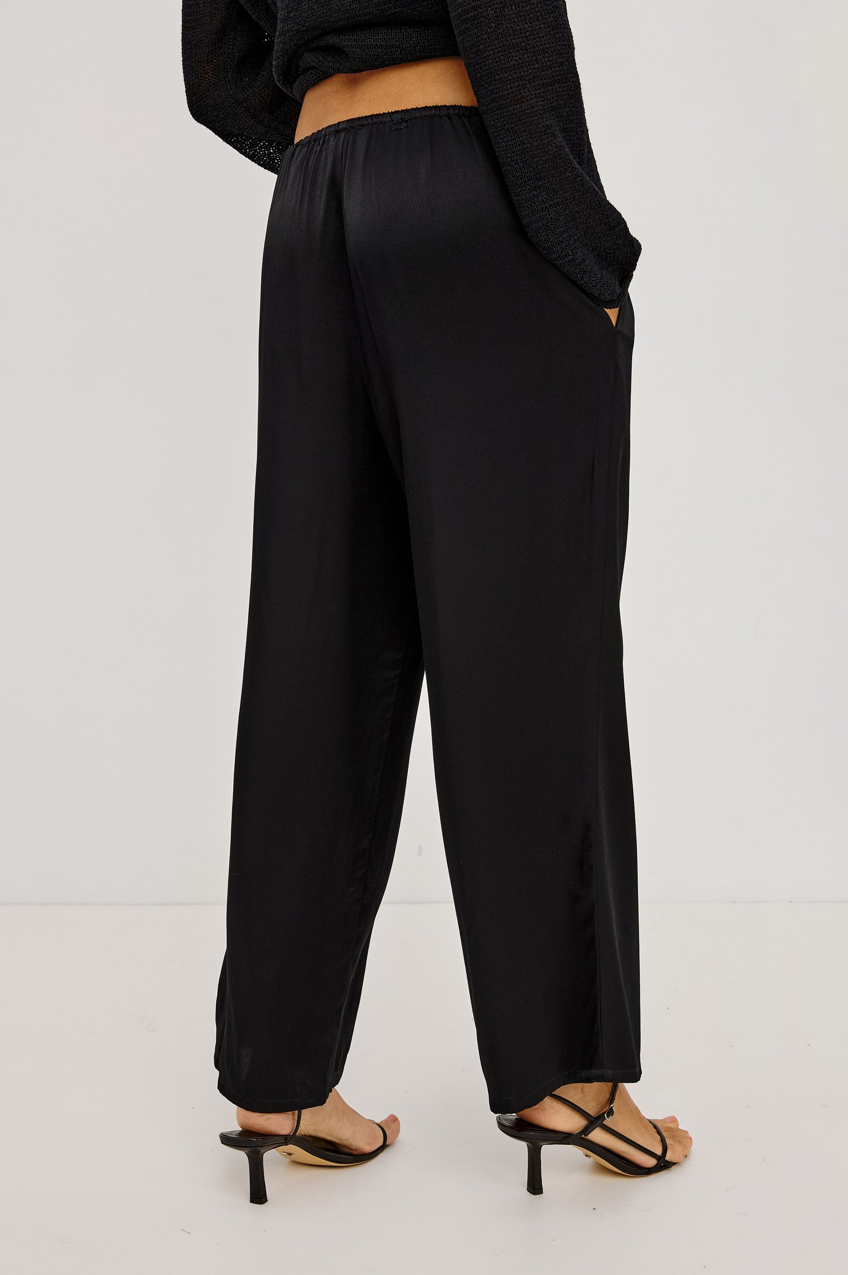 Virgo Pant in Satin-Back Crepe With Srtaight Legs, Drawstring Waist, and Side-Seam Pockets in Black Colorway - Lower Body Back View Featured on Model
