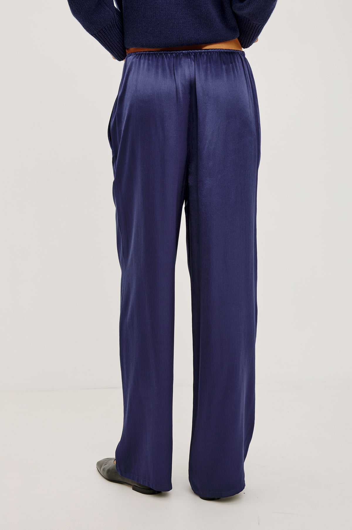 Virgo Pant in Satin-Back Crepe With Srtaight Legs, Drawstring Waist, and Side-Seam Pockets in Navy Colorway - Lower Body Back View Featured on Model