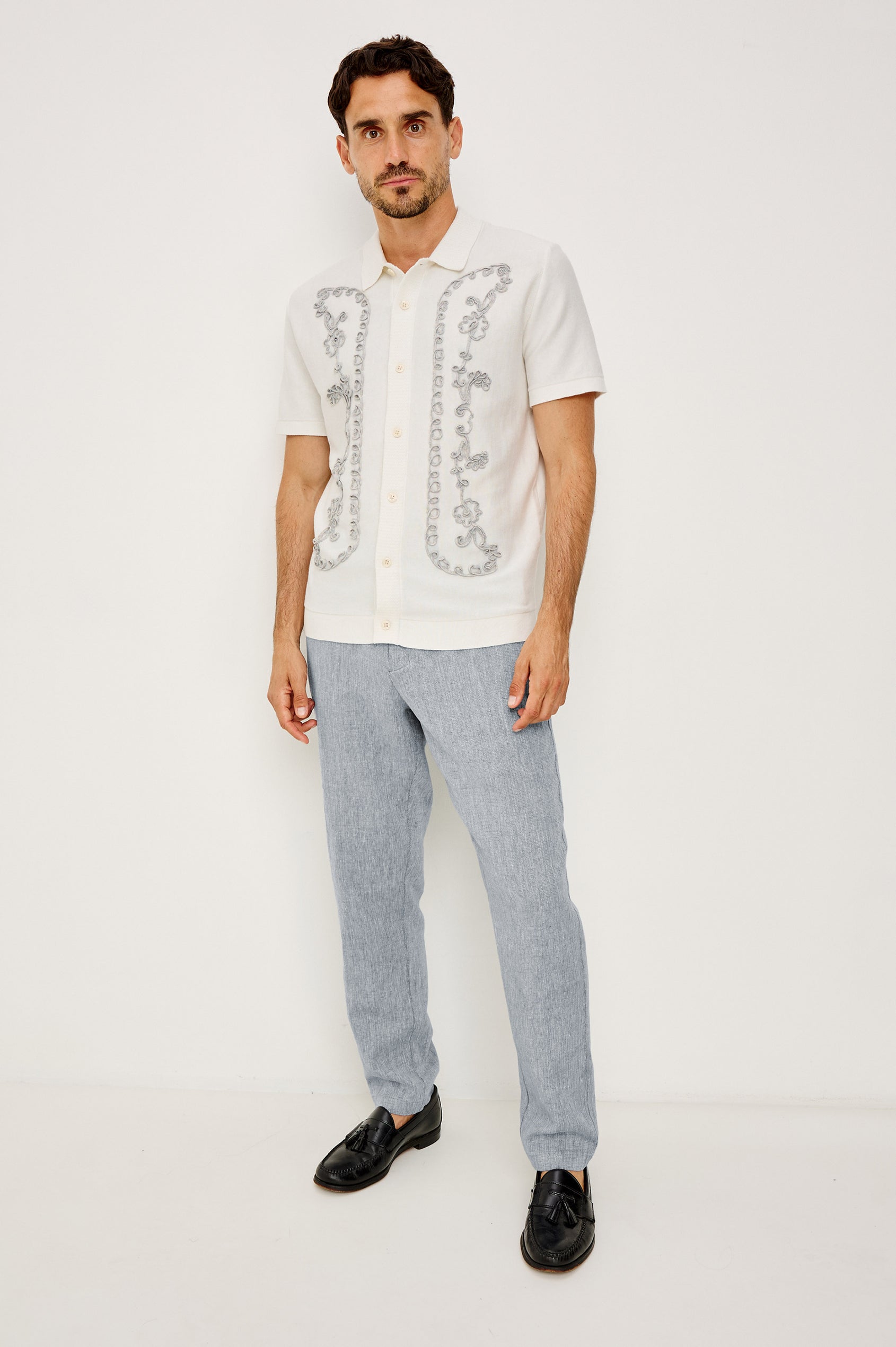 Walden Polo Shirt in Cotton Blend With Collar, Front Buttons, Full Needle Front Applique, and Classic Fit in White Oat Floral Colorway - Full Body Front View Featured on Model
