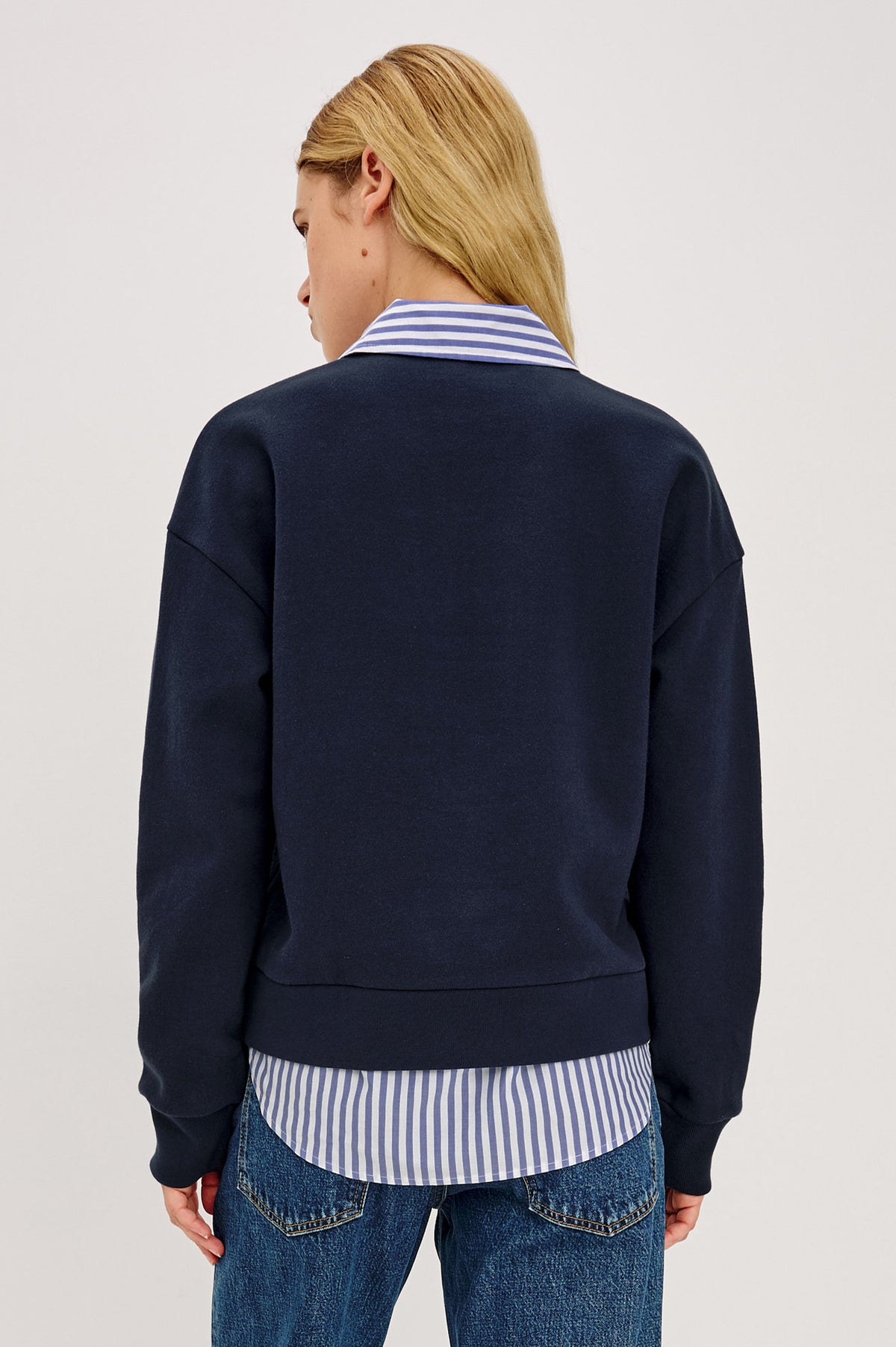 Waverly Sweatshirt in Soft Cotton With Half-Zip, Contrast Collar and Hem for Built-In Layering Effect, Relaxed, Boxy Fits, and Long Sleeves in Navy Colorway - Upper Body Back View Featured on Model.