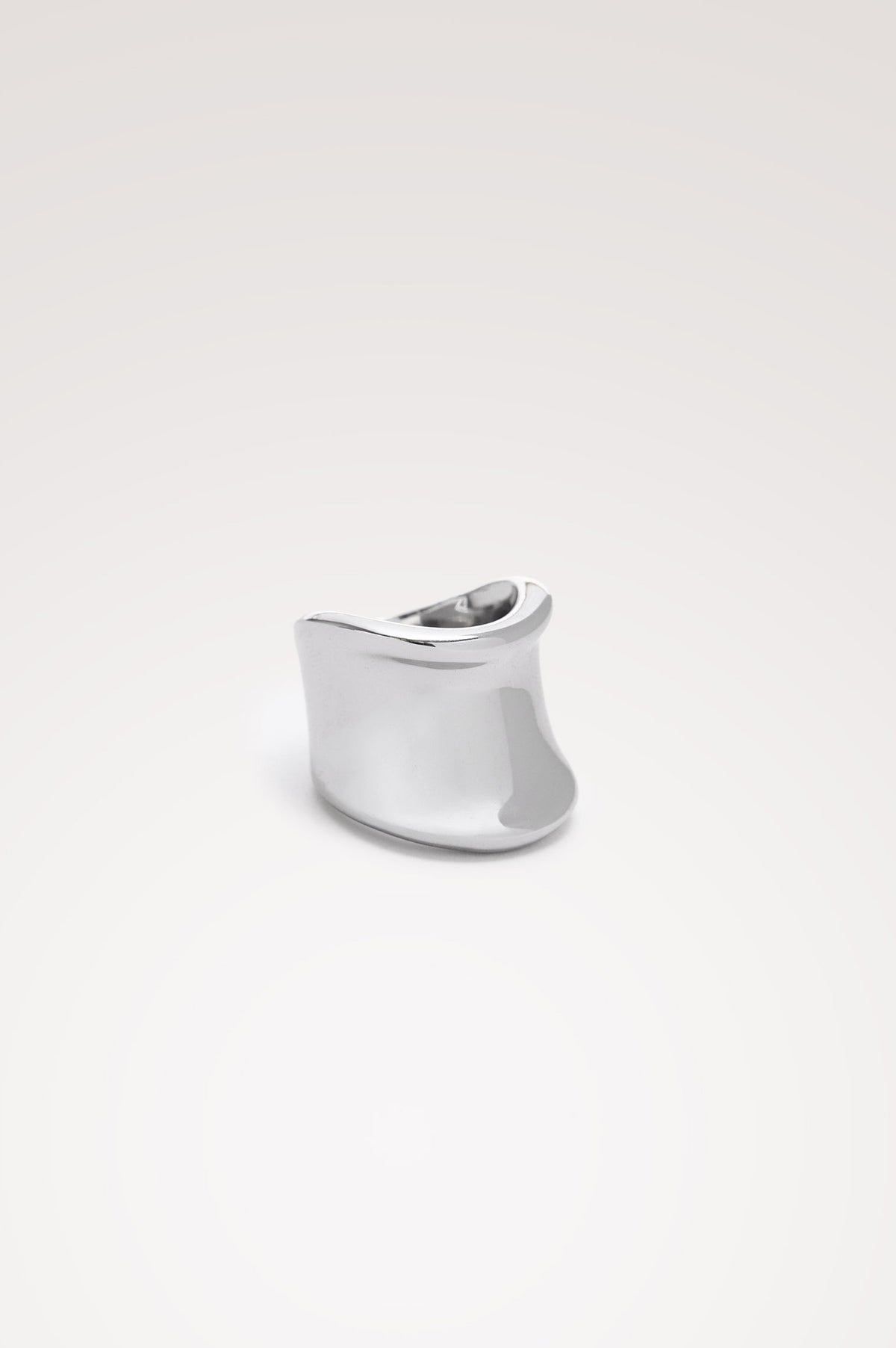 Wide Curved Ring With Engraved Rails Logo at Interior in Silver Colorway - Front view featured.
