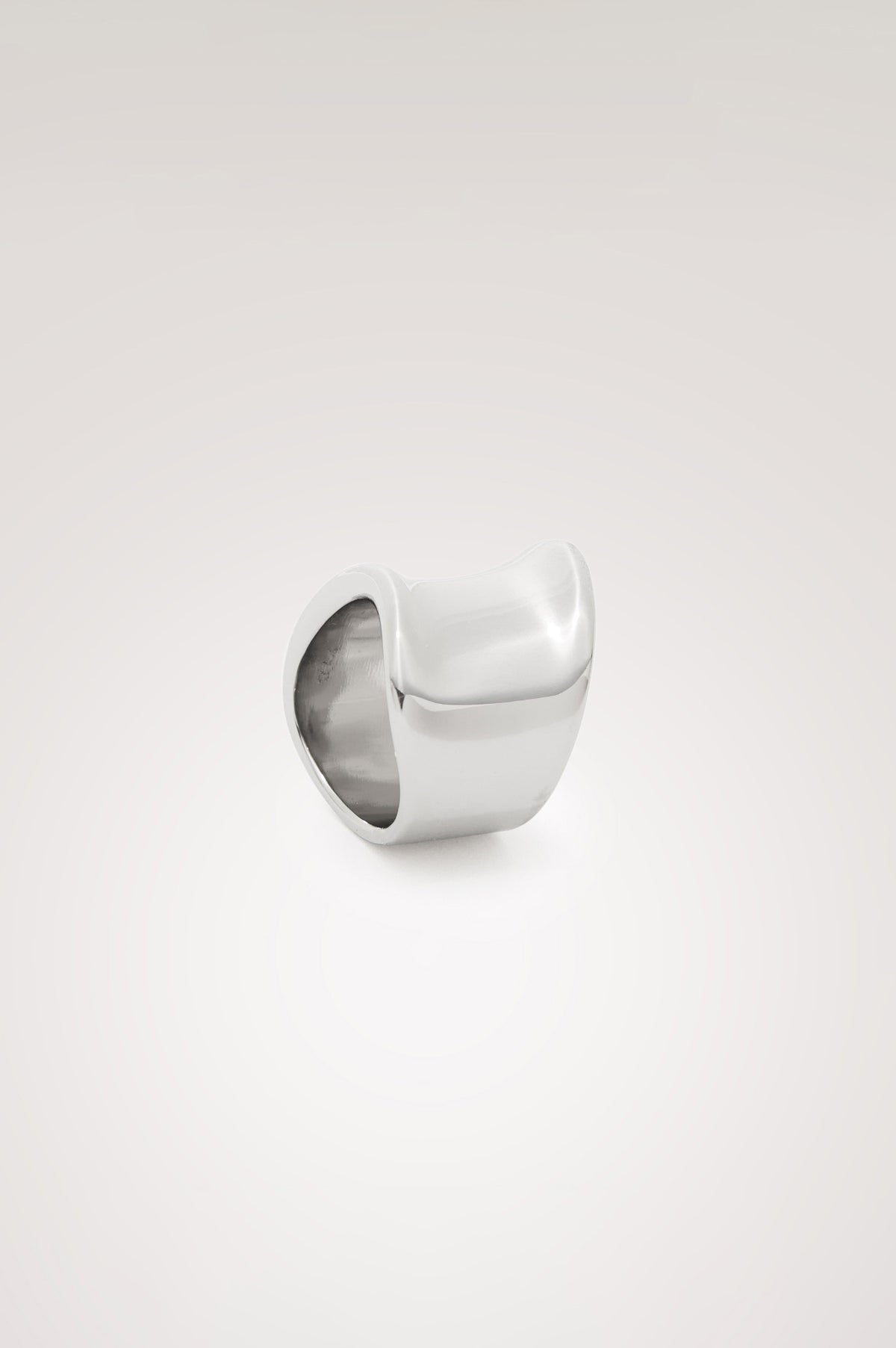 Wide Curved Ring With Engraved Rails Logo at Interior in Silver Colorway - Side view featured