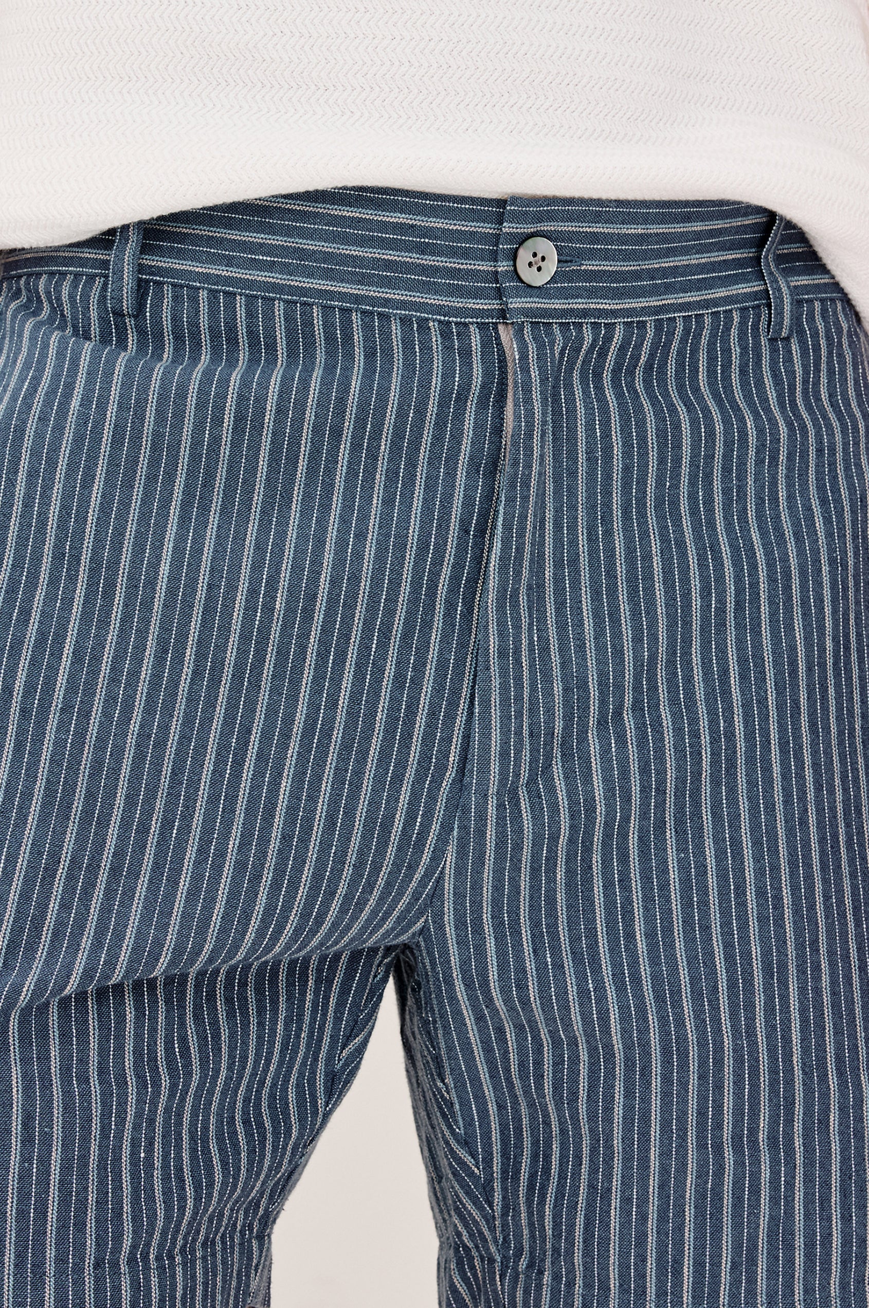 Wilson Short in Linen With a Straight Fit, Clean Front Waistband, Elasticated Back, Front Zip Fly, and Side Pockets in Navy Multi Stripe Colorway - Lower Body Front View Featured on Model