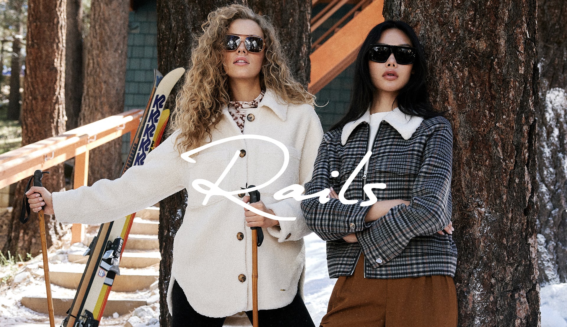EDITORIA IMAGE OF TWO MODELS AT A SKI RESORT