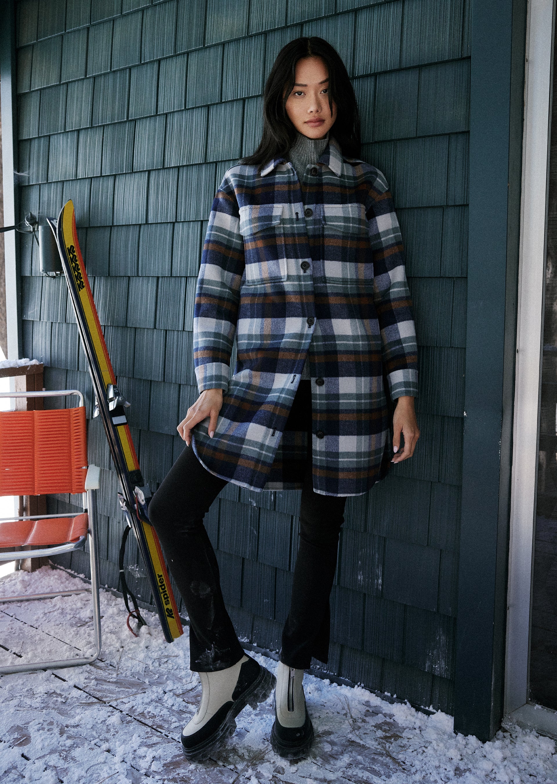 FRONT EDITORIAL IMAGE OF MODEL WEARING JARO COAT IN VAIL PLAID