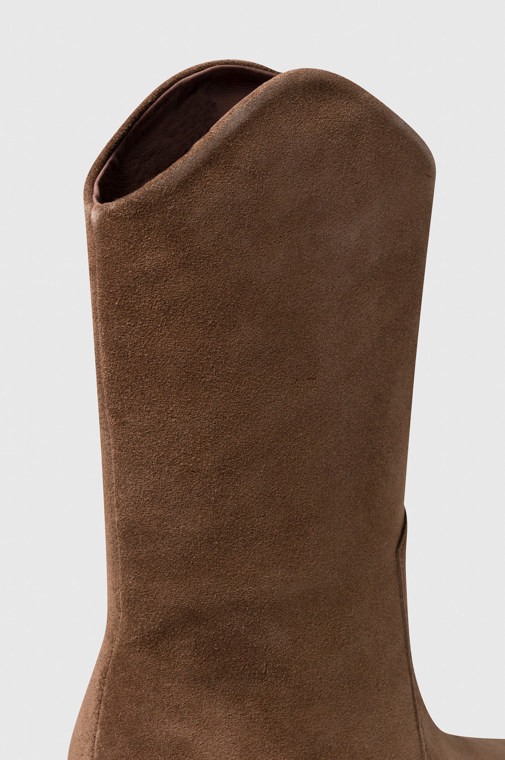 Worth mid calf pull on heeled Boot in sueded Brunette colorway - close up of side details