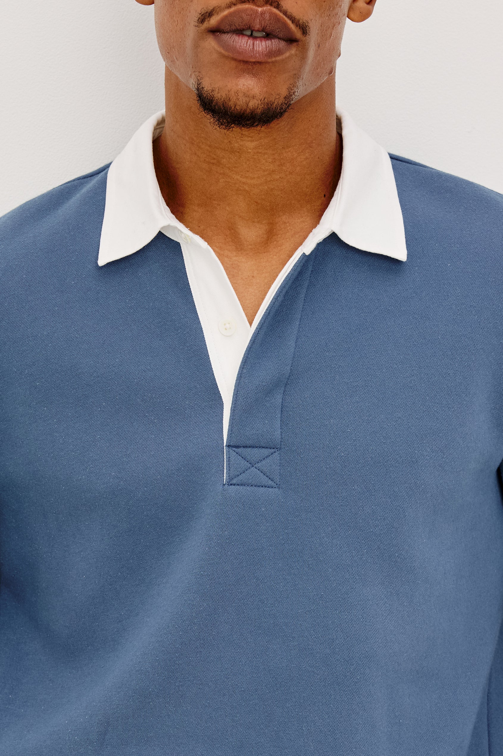 Wright Shirt in Midweight Fleece, Brushed Backing, Relaxed Fit, Vintage-Inspired Contrast Rugby Collar, Two-Button Placket, and Straight Hem With Side Slits in Vintage Steel Colorway - Upper Body Close Up View Featured on Model