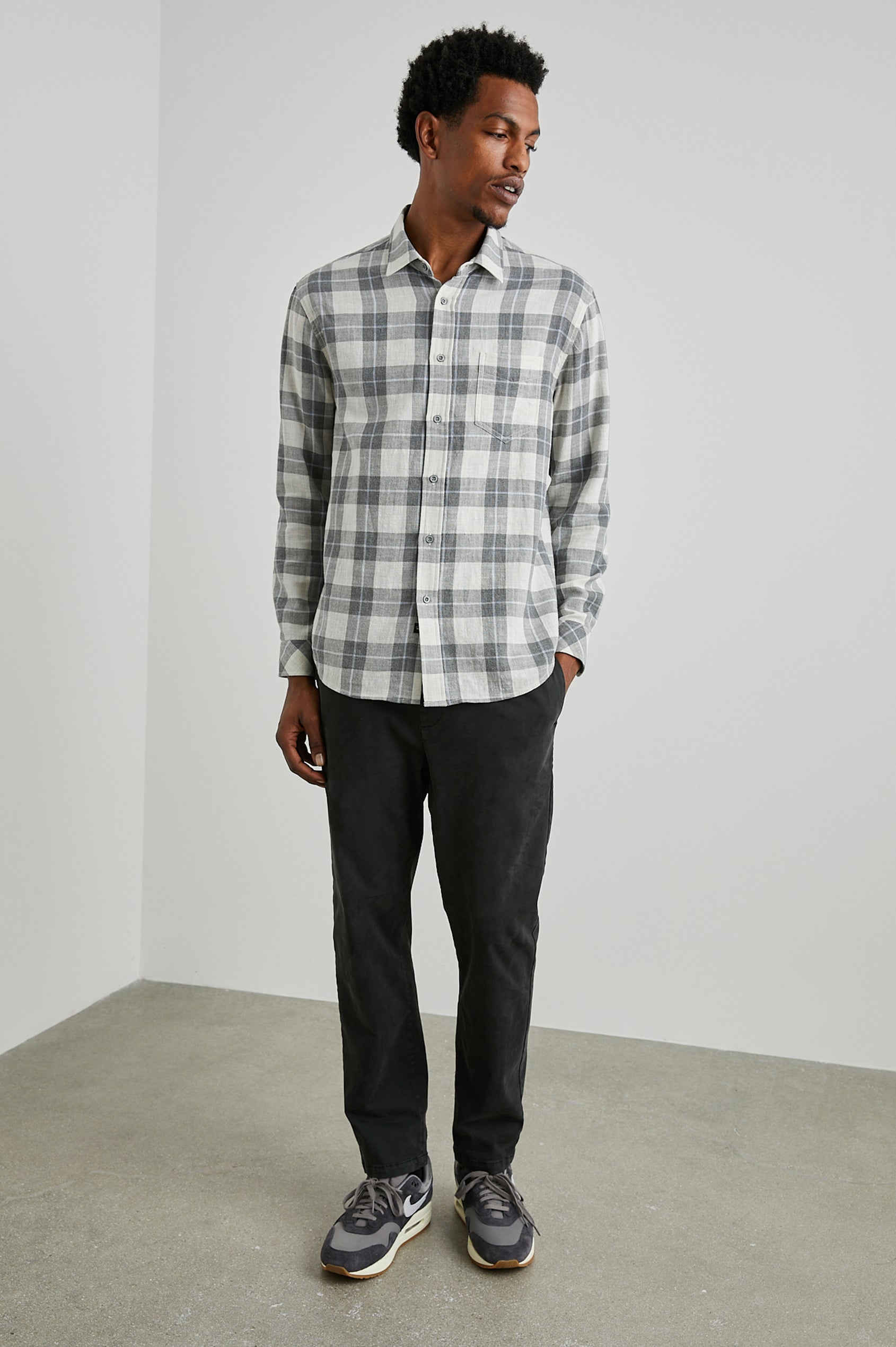 Wyatt Long-Sleeve Button Up with a Chest Patch Pocket in Anthrocite Sky Melange Colorway, a plaid with Anthrocite, Sky and Cream - Front Full Body View Featured on Model