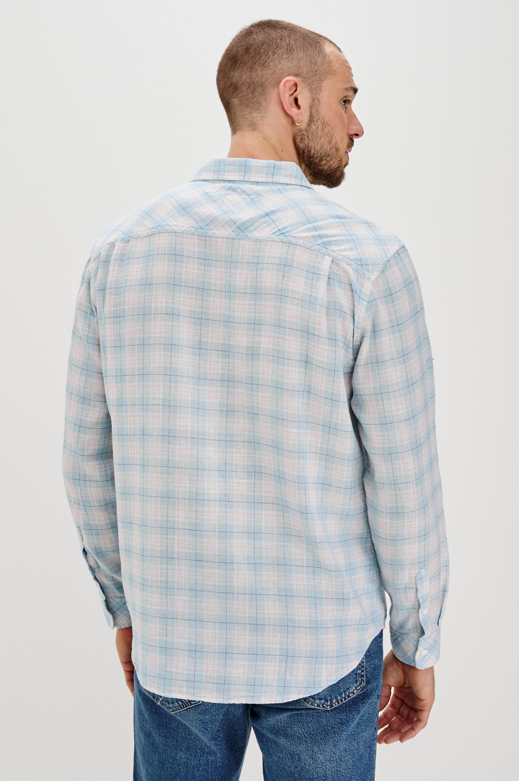 Wyatt Classic Button Up Long Sleeve Shirt with front chest pocket and plaid print in Apres Ocean Melange - back view on model