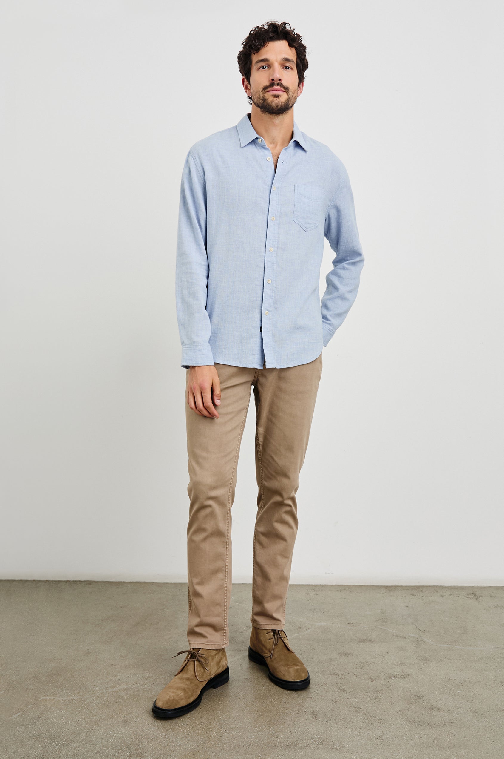 Wyatt Long-Sleeve Button Up with a Chest Patch Pocket in Blue Melange Colorway - Front Full Body View Featured on Model