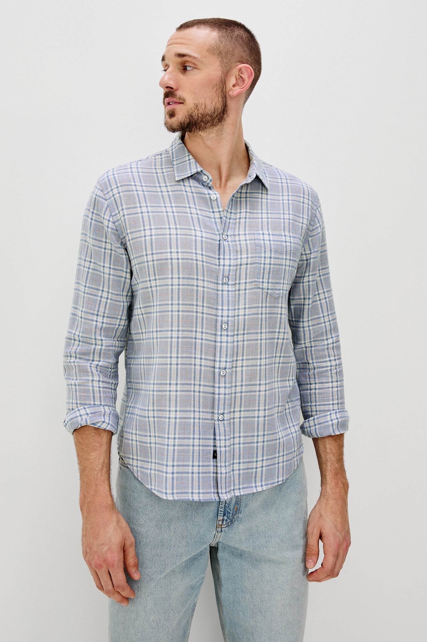 Wyatt Classic Button Up Long Sleeve Shirt with front chest pocket and plaid print in Bluefin Coral - front view on model