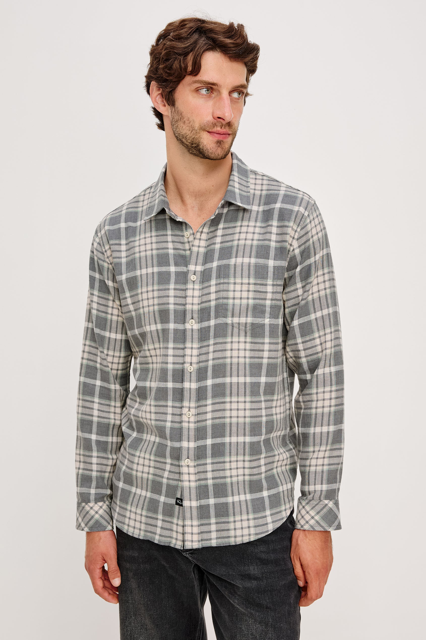 Wyatt Collared Button Front Shirt with Long Sleeves and a Chest Pocket in Camembert Charcoal Melange Colorway. Front View Shown on Model.