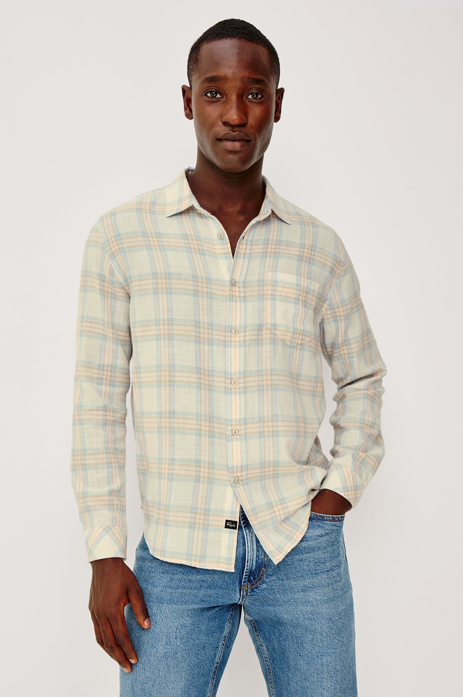 Wyatt Button Front Collared Shirt With Long Sleeves and Single Chest Pocket in Conch Shore Colorway - Upper Body Front View Featured on Model