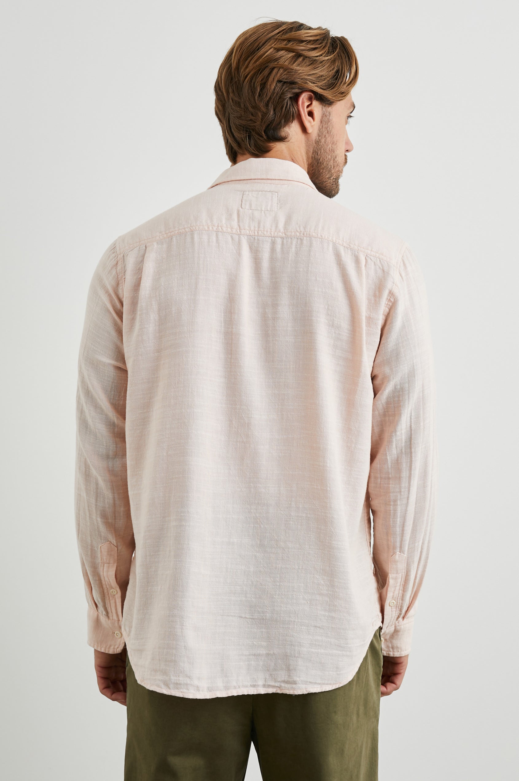 Wyatt Long-Sleeve Button Up with a Chest Patch Pocket in Ebi Colorway - Back View Featured on Model