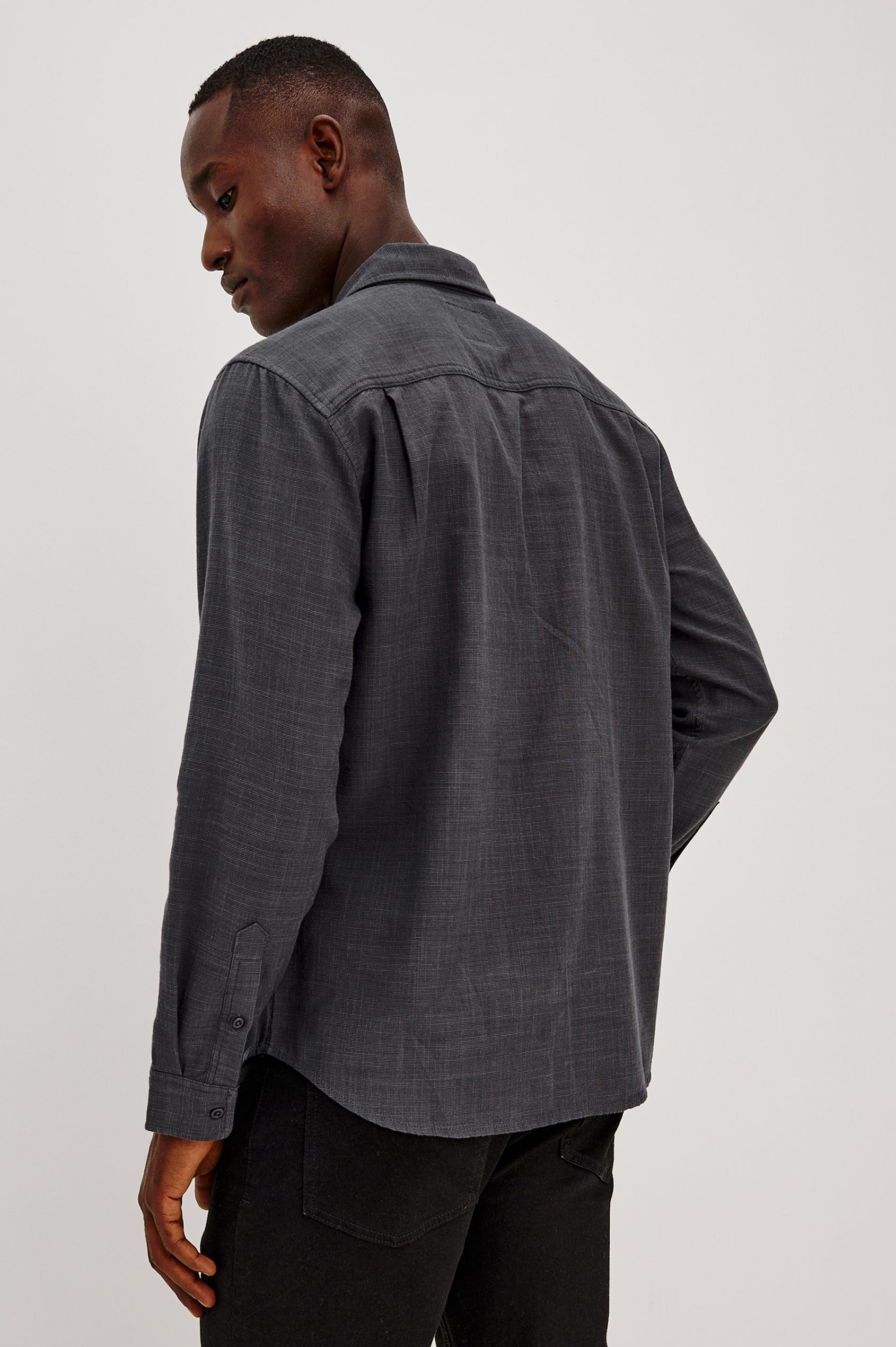 Wyatt Shirt in Cotton Slub Plainweave With Classic Fit, Collar, Button Front, Chest Patch Pocket, Long Sleeves, Shirttail Hem in Midnight Etch Colorway - Upper Body Back View Featured on Model