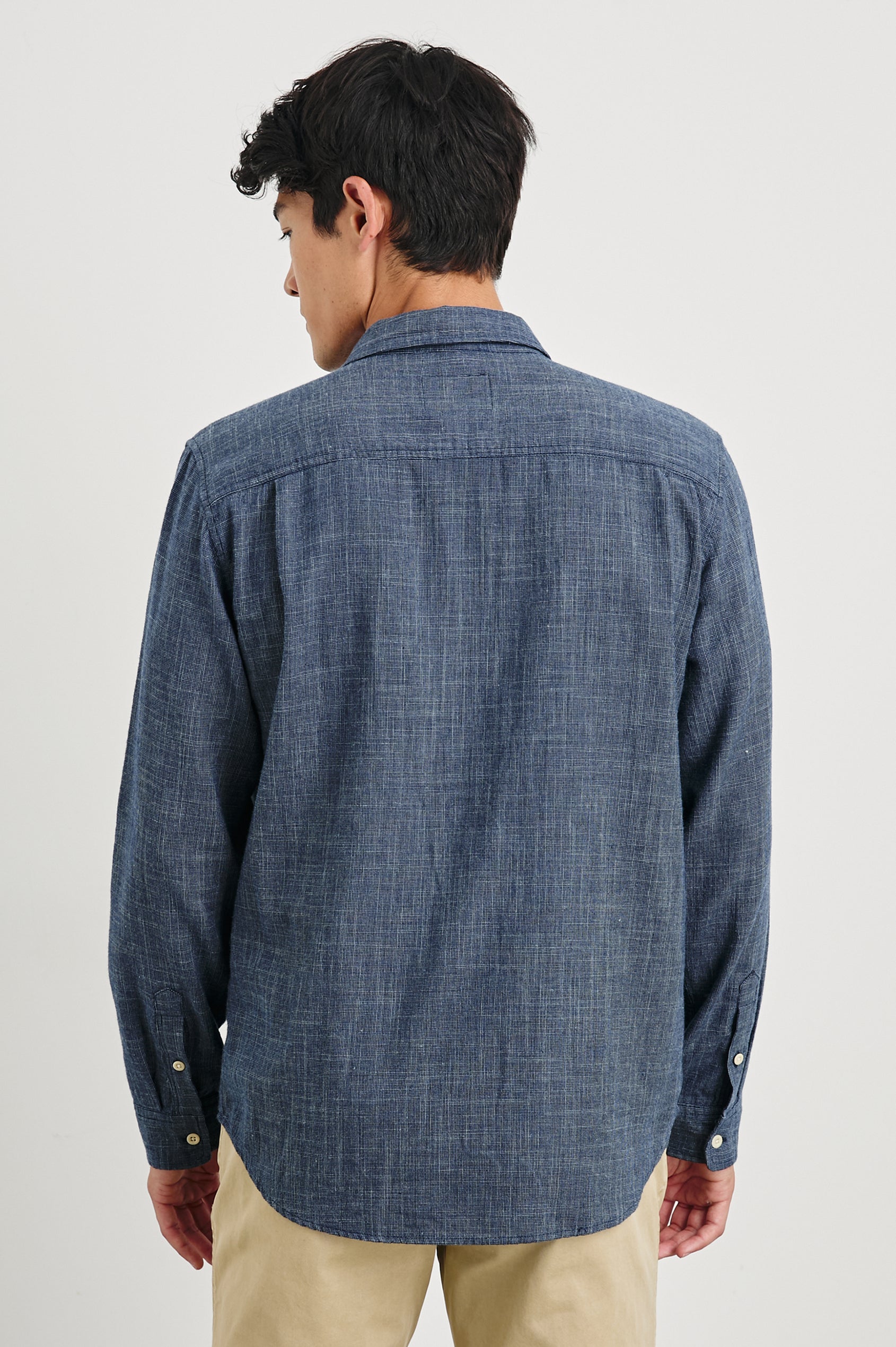 Wyatt Long-Sleeve Button Up with a Chest Patch Pocket in Navy Etch Colorway - Back View Featured on Model