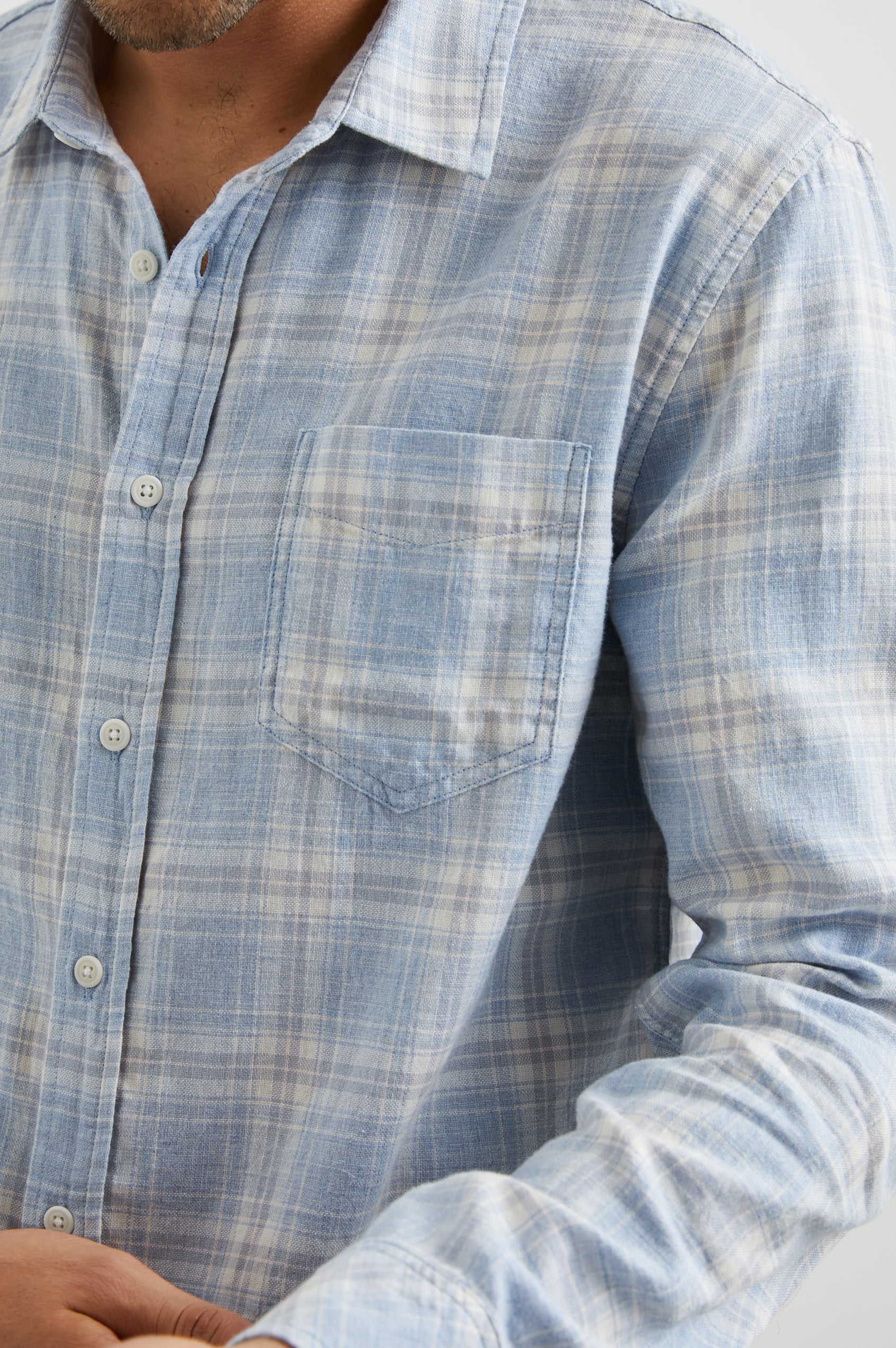 Wyatt Long-Sleeve Button Up with a Chest Patch Pocket in Rose Waterfall Colorway, a blue, grey and white plaid - Front View Featured on Model